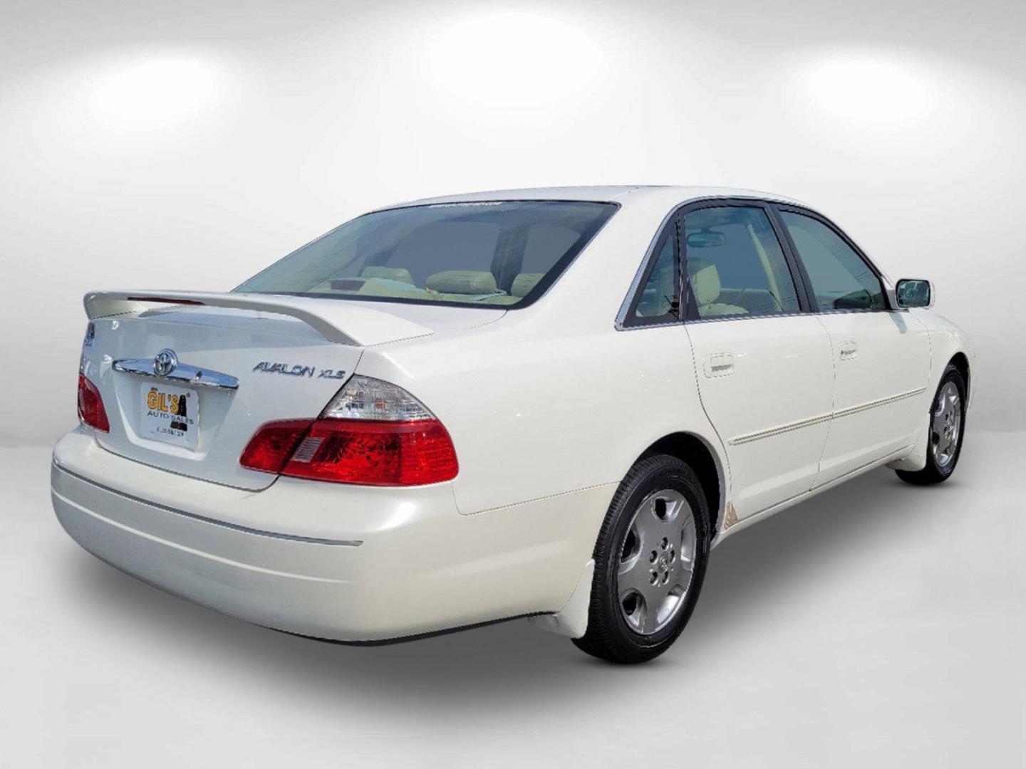 2003 White Toyota Avalon XLS (4T1BF28B23U) with an Gas V6 3.0L/183 engine, 4-Speed Automatic w/OD transmission, located at 804 22nd Ave, Phenix City, AL, 36870, (334) 297-1860, 32.484749, -85.024475 - 2003 Toyota Avalon XLS - Photo#4