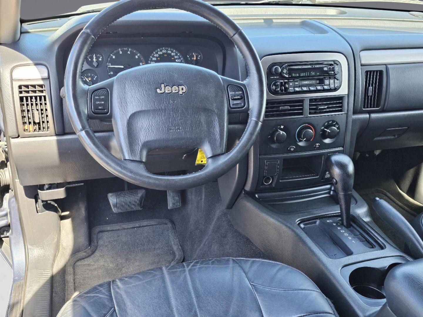 2004 Steel Blue Pearl /Dark Slate Gray Jeep Grand Cherokee Laredo (1J4GX48S34C) with an Gas I6 4.0L/242 engine, 4-Speed Automatic w/OD transmission, located at 5115 14th Ave., Columbus, GA, 31904, (706) 323-0345, 32.511494, -84.971046 - 2004 Jeep Grand Cherokee Laredo - Photo#12