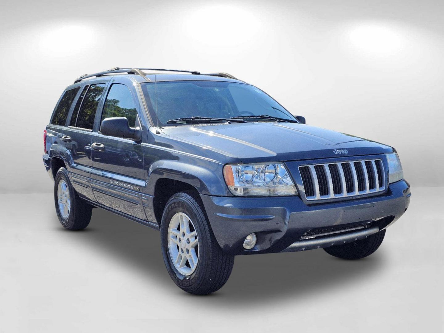 2004 Steel Blue Pearl /Dark Slate Gray Jeep Grand Cherokee Laredo (1J4GX48S34C) with an Gas I6 4.0L/242 engine, 4-Speed Automatic w/OD transmission, located at 5115 14th Ave., Columbus, GA, 31904, (706) 323-0345, 32.511494, -84.971046 - 2004 Jeep Grand Cherokee Laredo - Photo#2