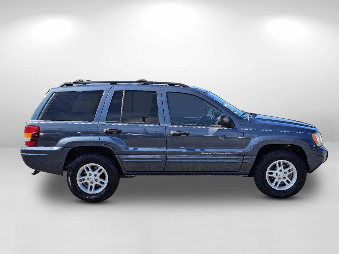 2004 Steel Blue Pearl /Dark Slate Gray Jeep Grand Cherokee Laredo (1J4GX48S34C) with an Gas I6 4.0L/242 engine, 4-Speed Automatic w/OD transmission, located at 5115 14th Ave., Columbus, GA, 31904, (706) 323-0345, 32.511494, -84.971046 - 2004 Jeep Grand Cherokee Laredo - Photo#3