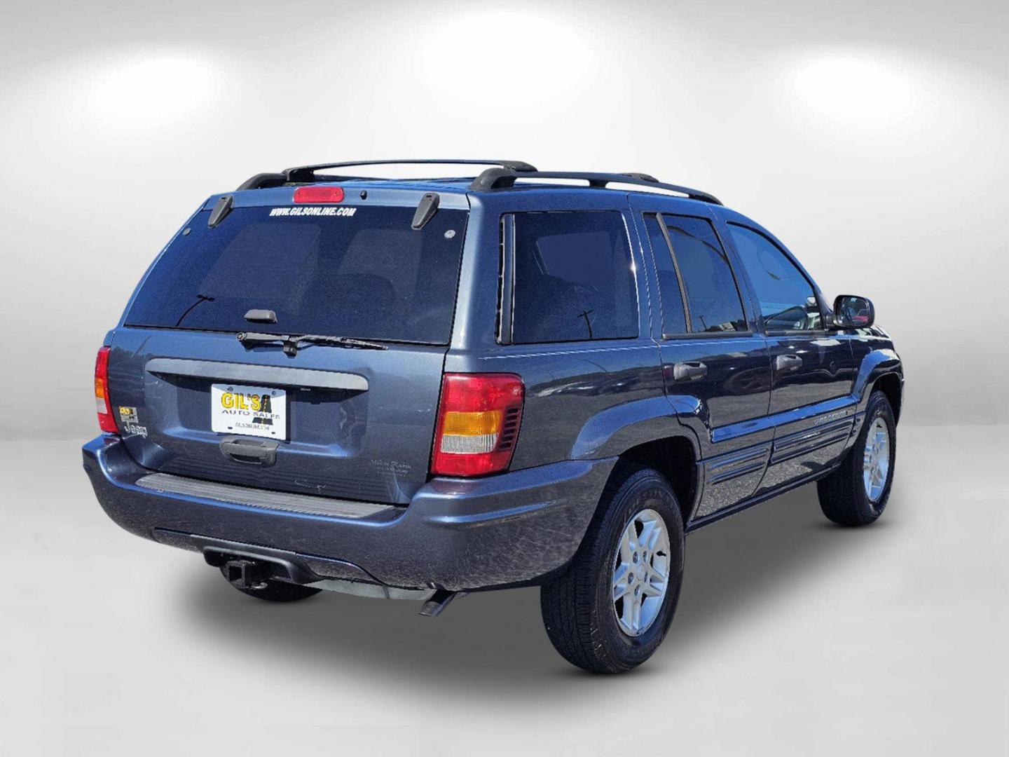 2004 Steel Blue Pearl /Dark Slate Gray Jeep Grand Cherokee Laredo (1J4GX48S34C) with an Gas I6 4.0L/242 engine, 4-Speed Automatic w/OD transmission, located at 5115 14th Ave., Columbus, GA, 31904, (706) 323-0345, 32.511494, -84.971046 - 2004 Jeep Grand Cherokee Laredo - Photo#4