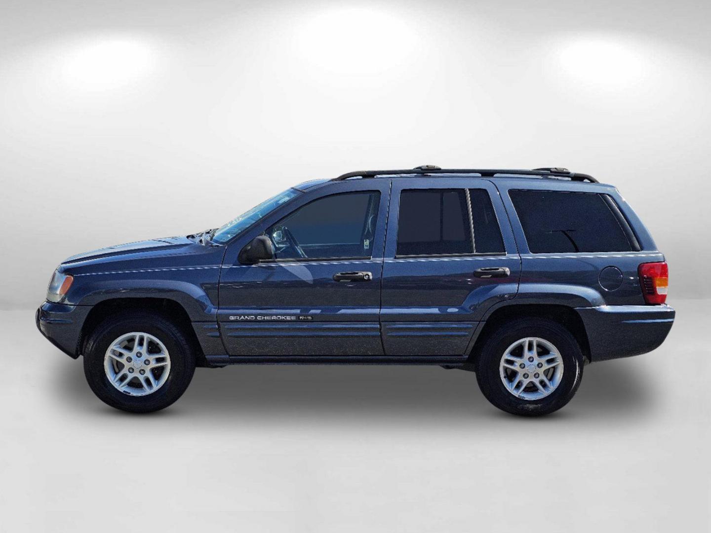 2004 Steel Blue Pearl /Dark Slate Gray Jeep Grand Cherokee Laredo (1J4GX48S34C) with an Gas I6 4.0L/242 engine, 4-Speed Automatic w/OD transmission, located at 5115 14th Ave., Columbus, GA, 31904, (706) 323-0345, 32.511494, -84.971046 - 2004 Jeep Grand Cherokee Laredo - Photo#7