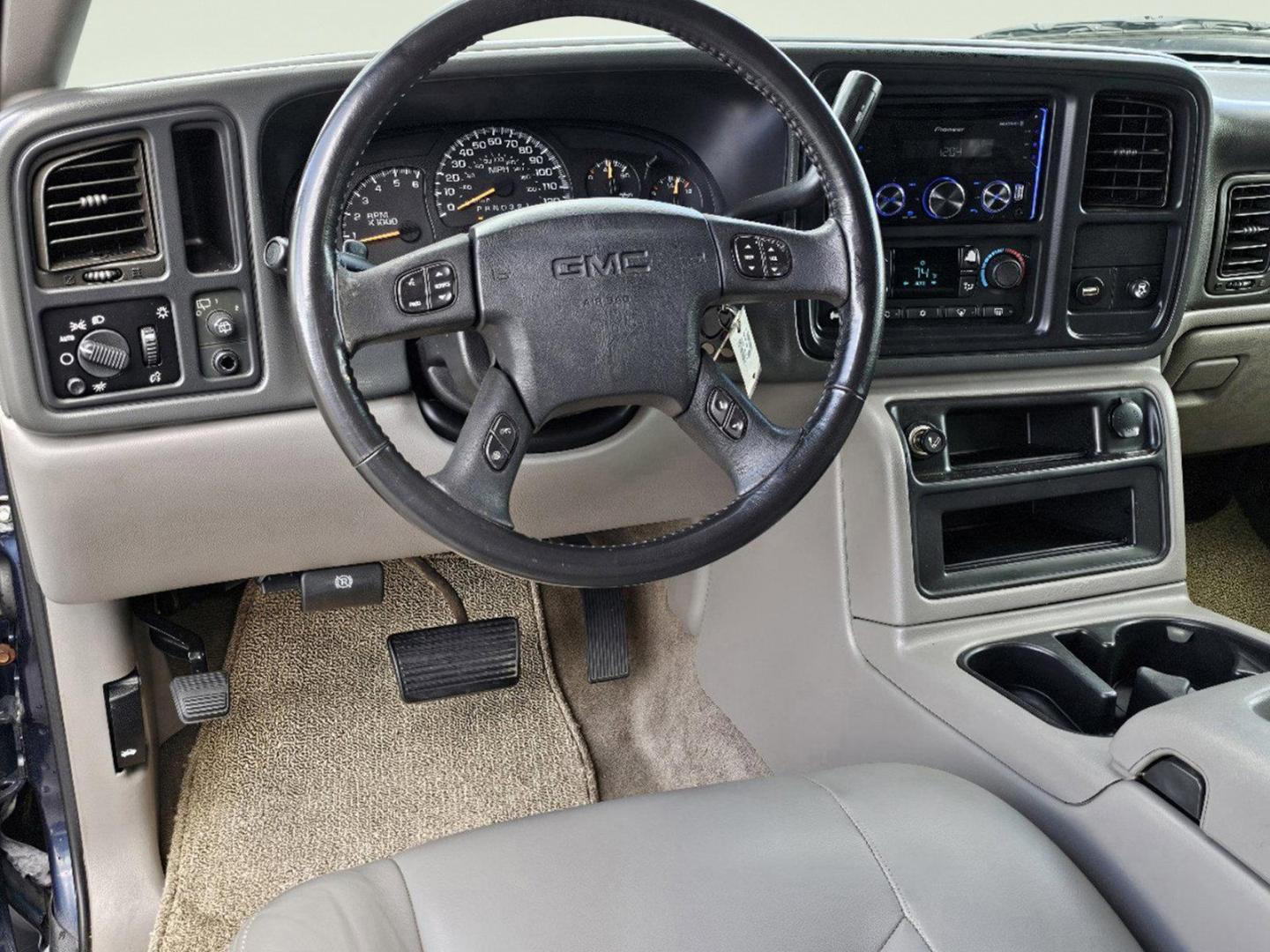 2006 Deep Blue Metallic /Pewter/Dark Pewter GMC Yukon SLT (1GKEC13T76R) with an Gas/Ethanol V8 5.3L/325 engine, 4-Speed Automatic w/OD transmission, located at 804 22nd Ave, Phenix City, AL, 36870, (334) 297-1860, 32.484749, -85.024475 - 2006 GMC Yukon SLT - Photo#12