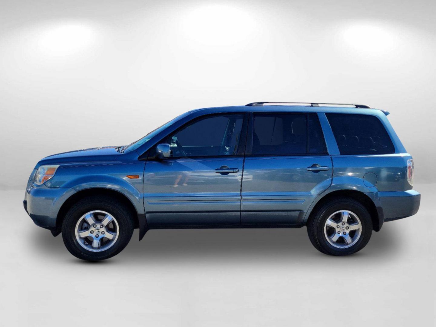 2006 Blue Honda Pilot EX-L (5FNYF28506B) with an Gas V6 3.5L/212 engine, 5-Speed Automatic w/OD transmission, located at 7000 Northlake Connector, Columbus, GA, 31904, (706) 987-8085, 32.524975, -84.978134 - 2006 Honda Pilot EX-L - Photo#7