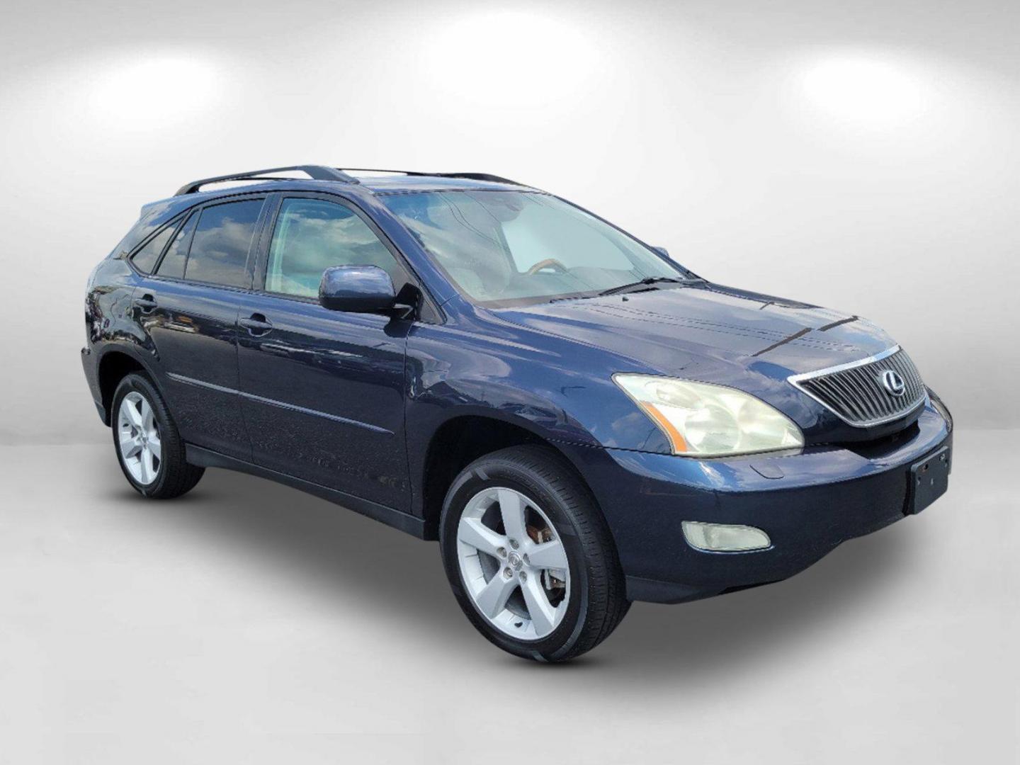 2006 Blue Lexus RX 330 (2T2GA31U66C) with an Gas V6 3.3L/202 engine, 5-Speed Automatic w/OD transmission, located at 1430 Gateway Drive, Opelika, AL, 36801, (334) 239-0944, 32.637871, -85.409790 - 2006 Lexus RX 330 - Photo#2