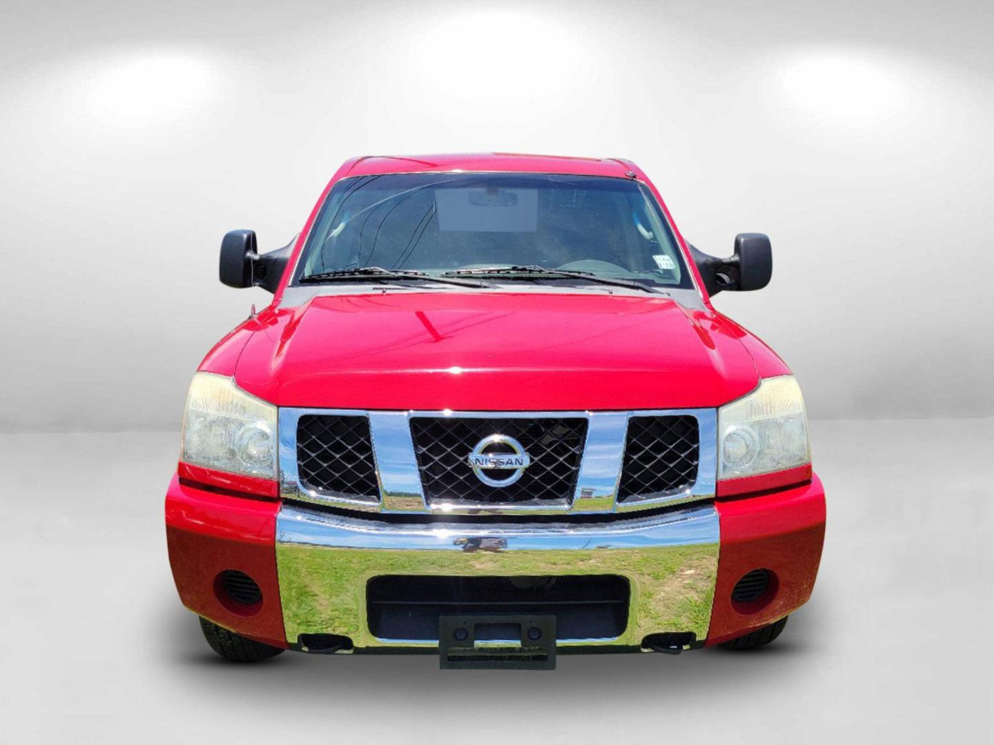 2006 Red Nissan Titan (1N6BA07BX6N) with an Gas/Ethanol V8 5.6L/339 engine, 5-Speed Automatic w/OD transmission, located at 7000 Northlake Connector, Columbus, GA, 31904, (706) 987-8085, 32.524975, -84.978134 - 2006 Nissan Titan - Photo#1