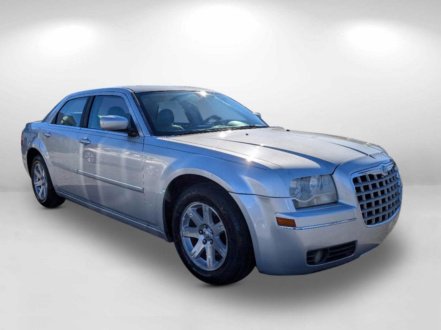 2007 Chrysler 300 Touring (2C3KA53G57H) with an Gas V6 3.5L/215 engine, 5-Speed Automatic transmission, located at 3959 U.S. 80 W, Phenix City, AL, 36870, (334) 297-4885, 32.469296, -85.135185 - 2007 Chrysler 300 Touring - Photo#2