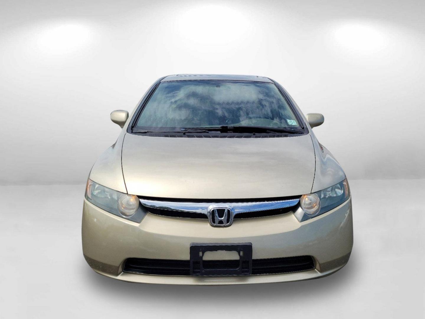 2007 Gold Honda Civic Sdn EX (1HGFA16877L) with an Gas I4 1.8L/110 engine, 5-Speed Automatic transmission, located at 1430 Gateway Drive, Opelika, AL, 36801, (334) 239-0944, 32.637871, -85.409790 - 2007 Honda Civic Sdn EX - Photo#1