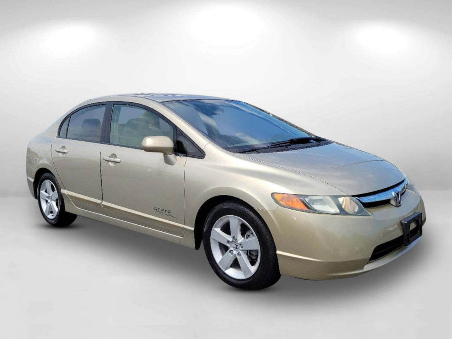 2007 Gold Honda Civic Sdn EX (1HGFA16877L) with an Gas I4 1.8L/110 engine, 5-Speed Automatic transmission, located at 1430 Gateway Drive, Opelika, AL, 36801, (334) 239-0944, 32.637871, -85.409790 - 2007 Honda Civic Sdn EX - Photo#2