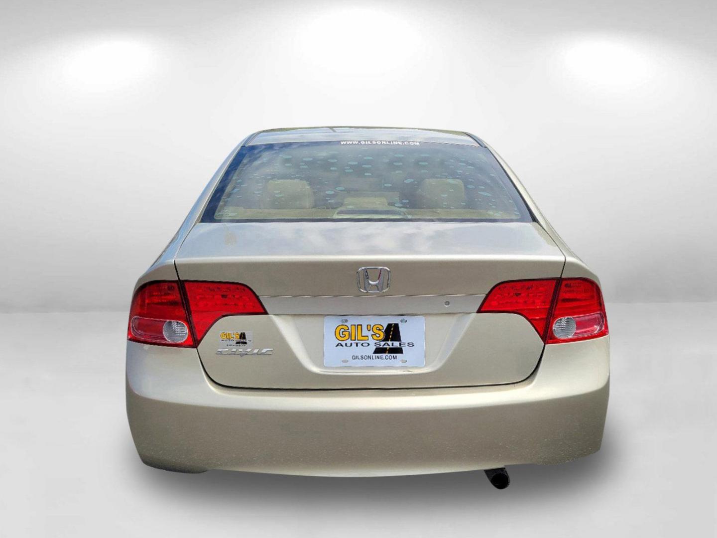 2007 Gold Honda Civic Sdn EX (1HGFA16877L) with an Gas I4 1.8L/110 engine, 5-Speed Automatic transmission, located at 1430 Gateway Drive, Opelika, AL, 36801, (334) 239-0944, 32.637871, -85.409790 - 2007 Honda Civic Sdn EX - Photo#5