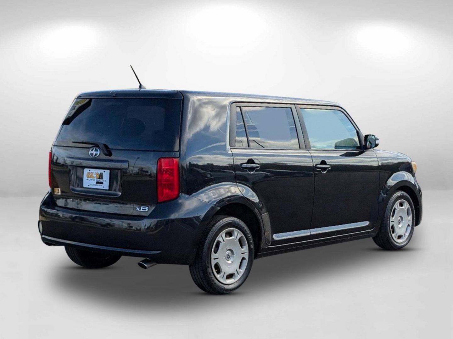 2009 Black Scion xB (JTLKE50E991) with an Gas I4 2.4L/144 engine, located at 1430 Gateway Drive, Opelika, AL, 36801, (334) 239-0944, 32.637871, -85.409790 - 2009 Scion xB - Photo#4