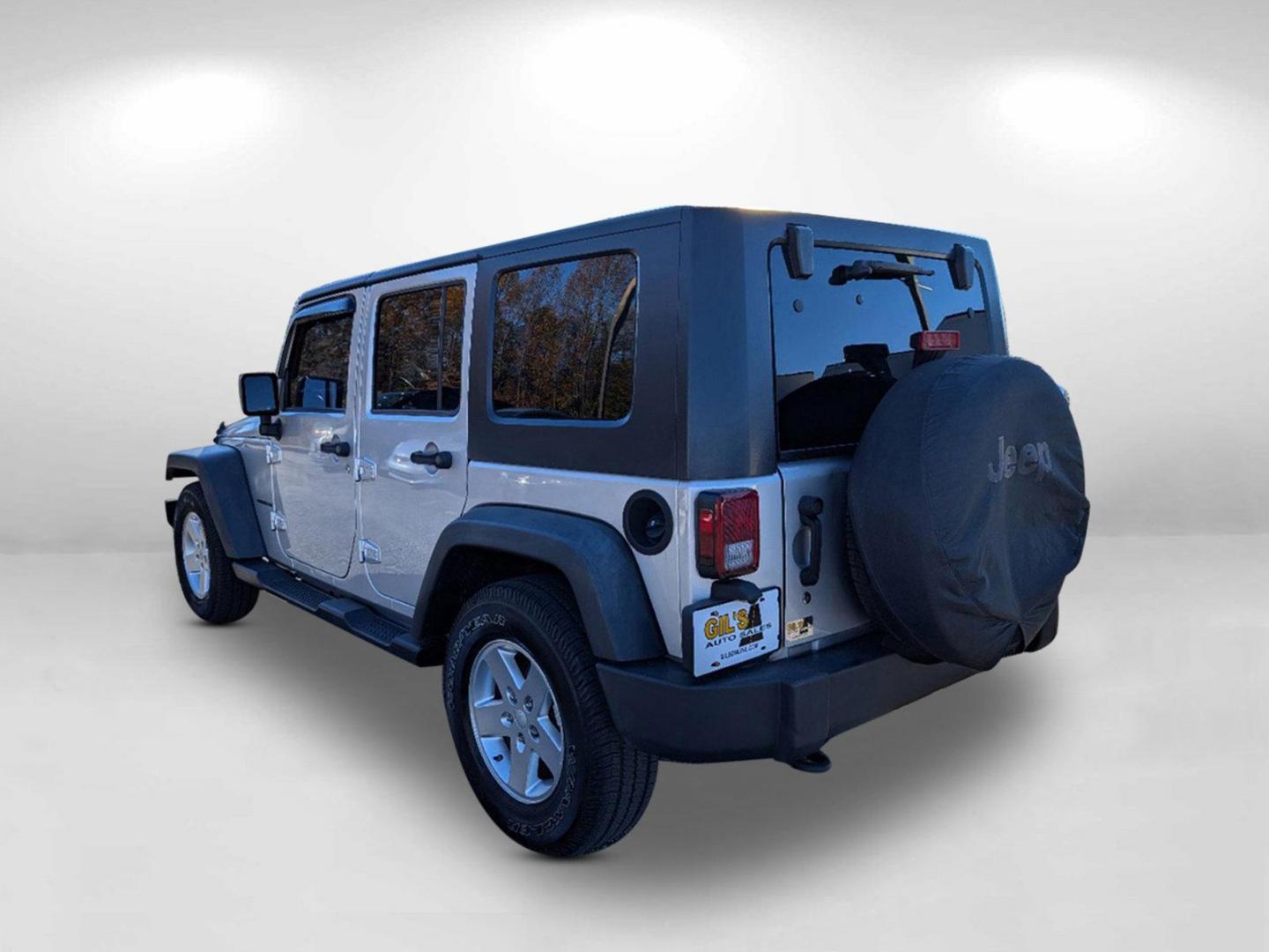 2010 /Dark Slate Gray/Medium Slate Gray Jeep Wrangler Unlimited Sport (1J4BB3H13AL) with an Gas V6 3.8L/231 engine, 4-Speed Automatic transmission, located at 1430 Gateway Drive, Opelika, AL, 36801, (334) 239-0944, 32.637871, -85.409790 - 2010 Jeep Wrangler Unlimited Sport - Photo#6