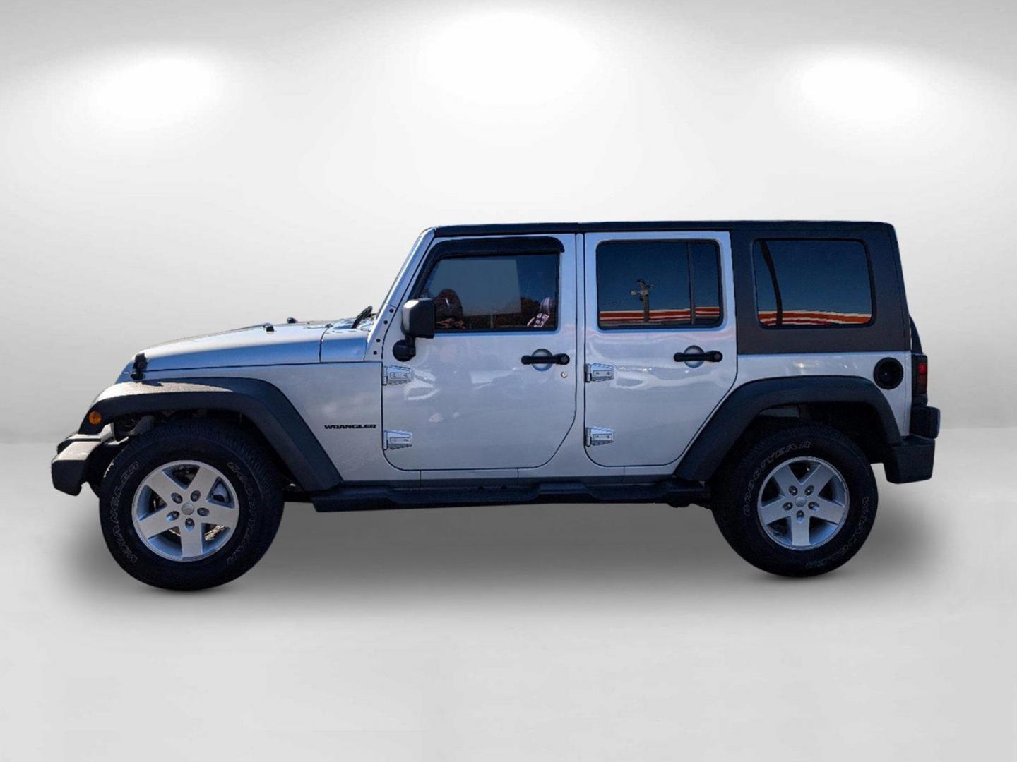 2010 /Dark Slate Gray/Medium Slate Gray Jeep Wrangler Unlimited Sport (1J4BB3H13AL) with an Gas V6 3.8L/231 engine, 4-Speed Automatic transmission, located at 3959 U.S. 80 W, Phenix City, AL, 36870, (334) 297-4885, 32.469296, -85.135185 - 2010 Jeep Wrangler Unlimited Sport - Photo#7