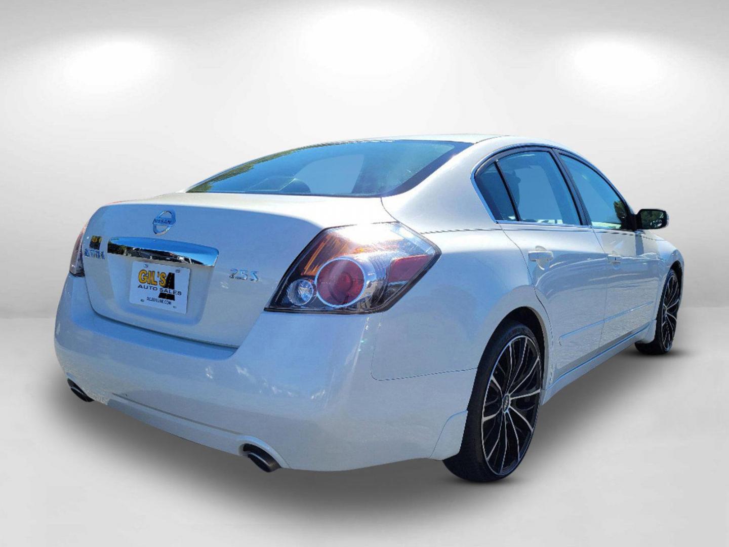 2010 Winter Frost Pearl /Charcoal Nissan Altima 2.5 S (1N4AL2AP9AN) with an Gas I4 2.5L/ engine, 1-Speed Continuously Variable transmission, located at 3959 U.S. 80 W, Phenix City, AL, 36870, (334) 297-4885, 32.469296, -85.135185 - 2010 Nissan Altima 2.5 S - Photo#4