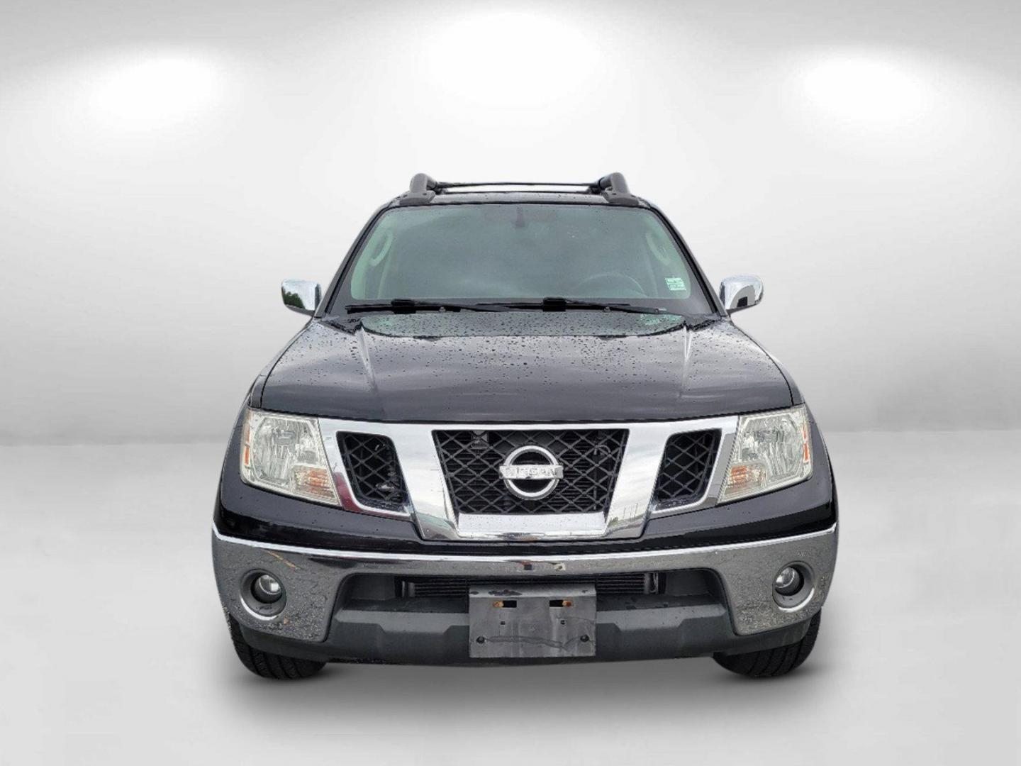 2010 Super Black /Graphite Nissan Frontier LE (1N6AD0ER7AC) with an Gas V6 4.0L/ engine, 5-Speed Automatic w/OD transmission, located at 7000 Northlake Connector, Columbus, GA, 31904, (706) 987-8085, 32.524975, -84.978134 - 2010 Nissan Frontier LE - Photo#1