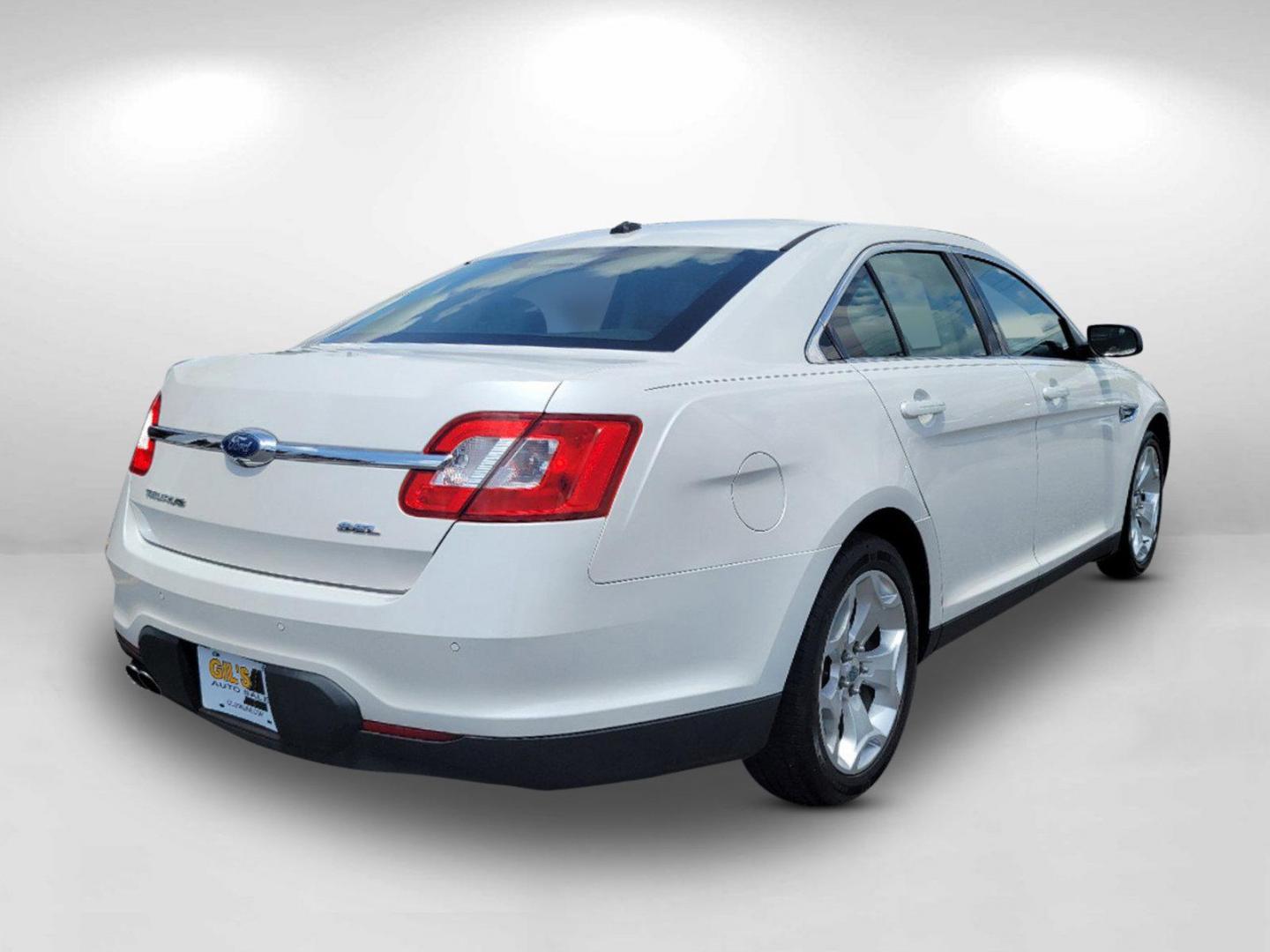 2011 White Ford Taurus SEL (1FAHP2EW2BG) with an Gas V6 3.5L/213 engine, 6-Speed Automatic w/OD SelectShift transmission, located at 1430 Gateway Drive, Opelika, AL, 36801, (334) 239-0944, 32.637871, -85.409790 - 2011 Ford Taurus SEL - Photo#4