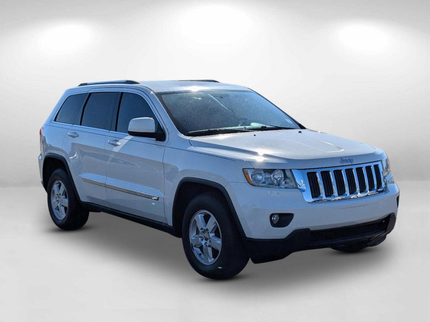 2011 /Black Interior Jeep Grand Cherokee Laredo (1J4RS4GGXBC) with an Gas/Ethanol V6 3.6L/220 engine, 5-Speed Automatic transmission, located at 521 Old Farm Lane Rd, Prattville, AL, 36066, (334) 325-1505, 32.482460, -86.416367 - 2011 Jeep Grand Cherokee Laredo - Photo#2