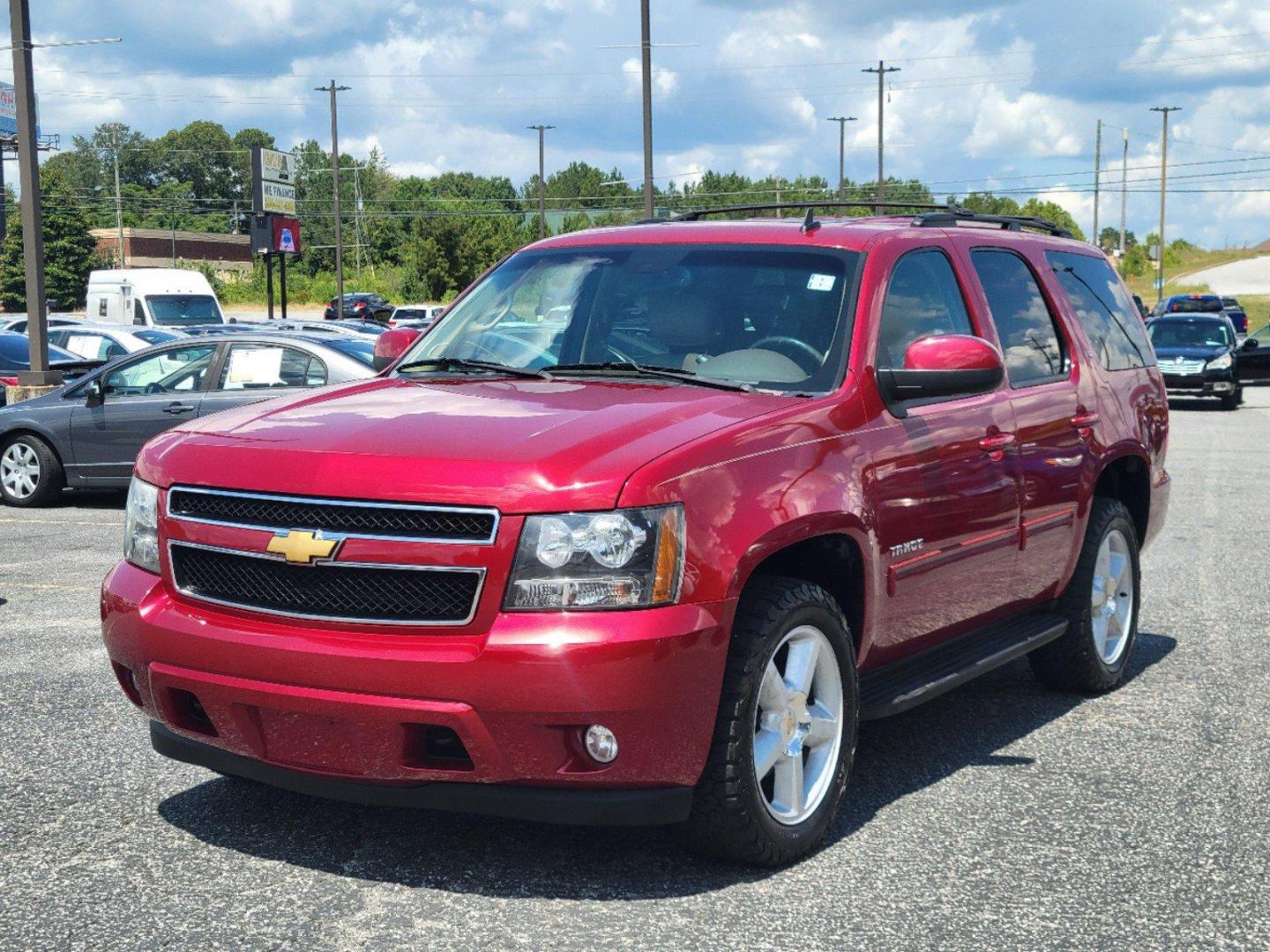 2012 Crystal Red Tintcoat /Light Cashmere/Dark Cashmere Chevrolet Tahoe LT (1GNSKBE05CR) with an Gas/Ethanol V8 5.3L/323 engine, 6-Speed Automatic w/OD transmission, located at 5115 14th Ave., Columbus, GA, 31904, (706) 323-0345, 32.511494, -84.971046 - 2012 Chevrolet Tahoe LT - Photo#1