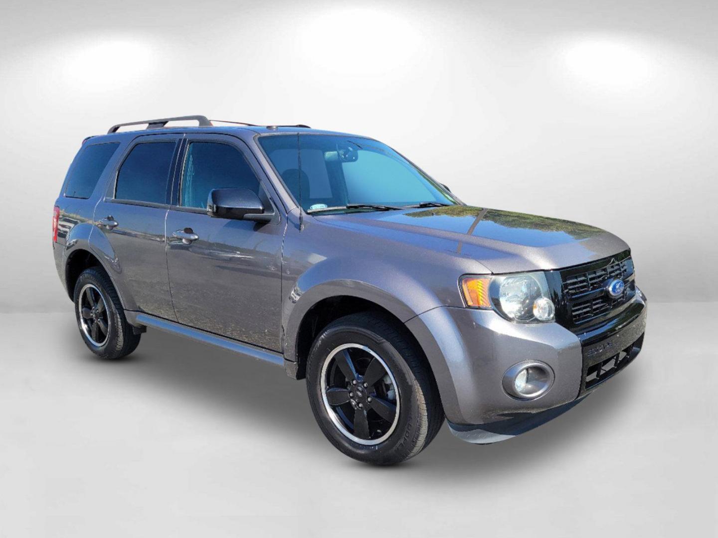 2012 Gray Ford Escape XLT (1FMCU0DGXCK) with an Gas/Ethanol V6 3.0L/181 engine, 6-Speed Automatic transmission, located at 7000 Northlake Connector, Columbus, GA, 31904, (706) 987-8085, 32.524975, -84.978134 - 2012 Ford Escape XLT - Photo#2