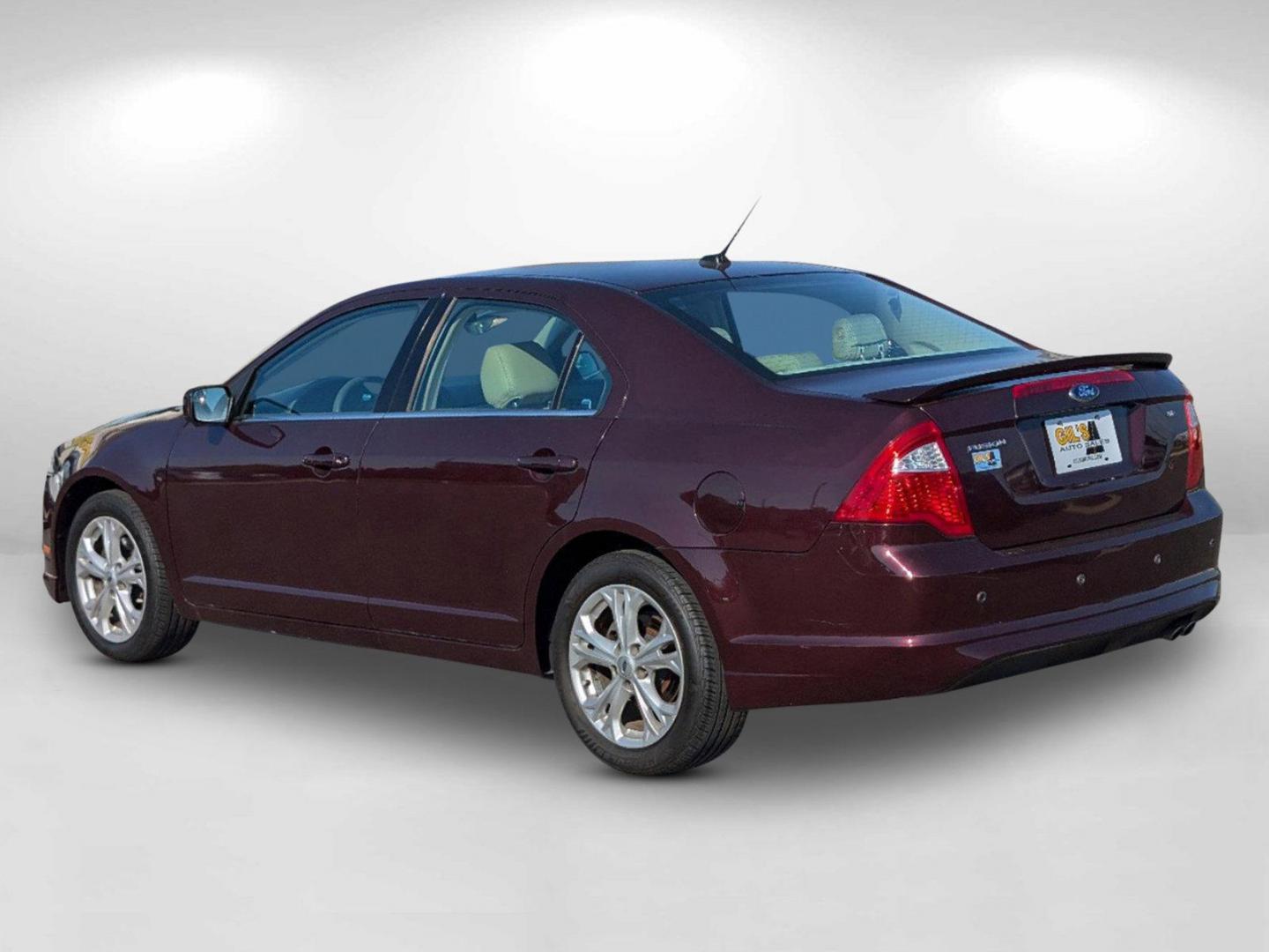 2012 Maroon Ford Fusion SE (3FAHP0HA0CR) with an Gas I4 2.5L/152 engine, 6-Speed Automatic transmission, located at 804 22nd Ave, Phenix City, AL, 36870, (334) 297-1860, 32.484749, -85.024475 - 2012 Ford Fusion SE - Photo#6