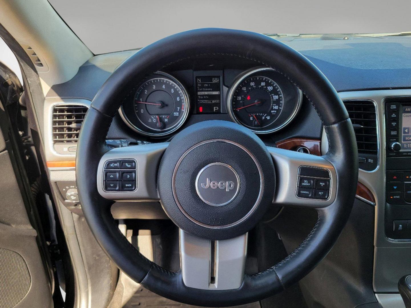 2012 Brilliant Black Crystal Pearl /Black Jeep Grand Cherokee Limited (1C4RJFBGXCC) with an Gas/Ethanol V6 3.6L/220 engine, 5-Speed Automatic transmission, located at 1430 Gateway Drive, Opelika, AL, 36801, (334) 239-0944, 32.637871, -85.409790 - 2012 Jeep Grand Cherokee Limited - Photo#13