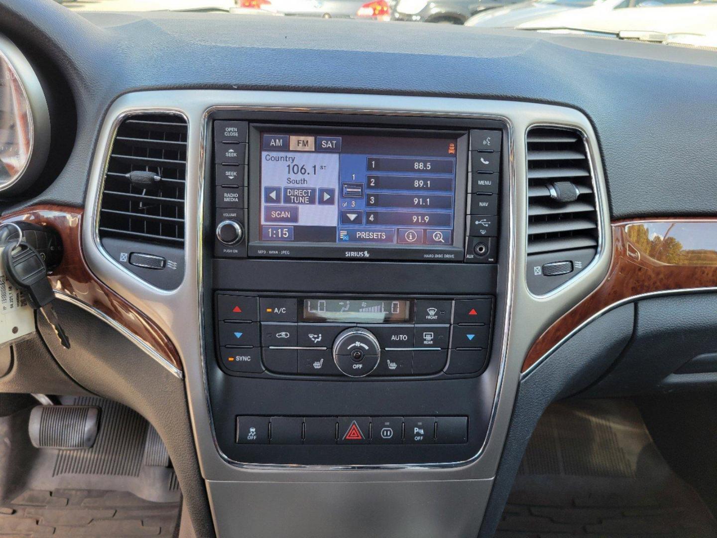 2012 Brilliant Black Crystal Pearl /Black Jeep Grand Cherokee Limited (1C4RJFBGXCC) with an Gas/Ethanol V6 3.6L/220 engine, 5-Speed Automatic transmission, located at 1430 Gateway Drive, Opelika, AL, 36801, (334) 239-0944, 32.637871, -85.409790 - 2012 Jeep Grand Cherokee Limited - Photo#15