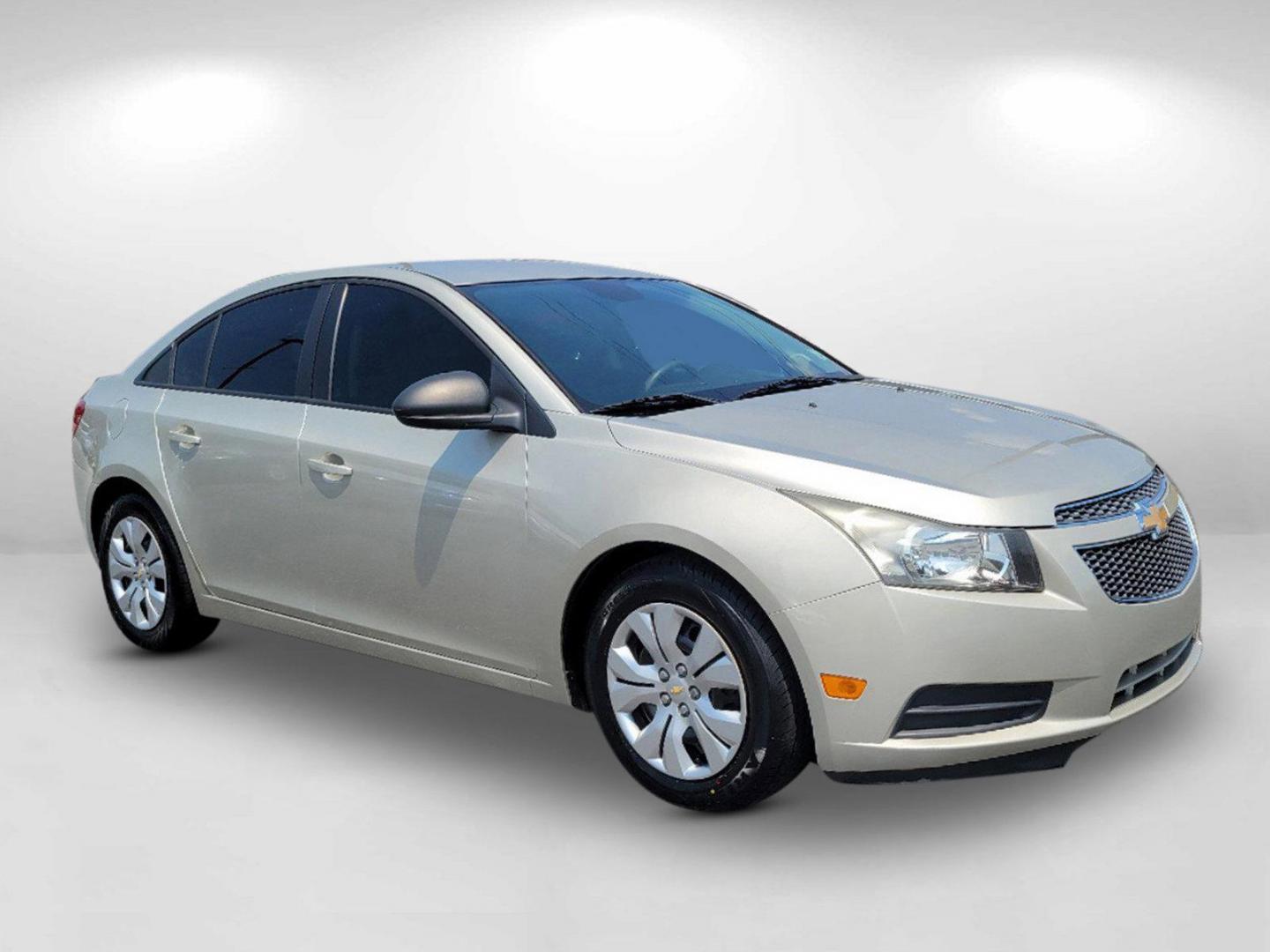 2013 Champagne Silver Metallic /Jet Black/Medium Titanium Chevrolet Cruze LS (1G1PA5SH9D7) with an Gas I4 1.8L/110 engine, 6-Speed Automatic transmission, located at 3959 U.S. 80 W, Phenix City, AL, 36870, (334) 297-4885, 32.469296, -85.135185 - 2013 Chevrolet Cruze LS - Photo#3