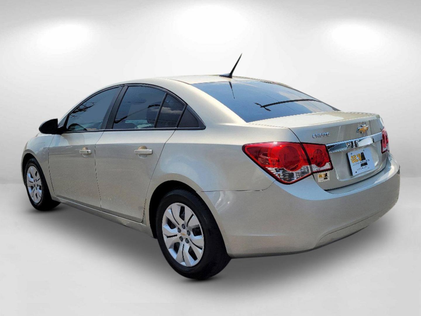 2013 Champagne Silver Metallic /Jet Black/Medium Titanium Chevrolet Cruze LS (1G1PA5SH9D7) with an Gas I4 1.8L/110 engine, 6-Speed Automatic transmission, located at 3959 U.S. 80 W, Phenix City, AL, 36870, (334) 297-4885, 32.469296, -85.135185 - 2013 Chevrolet Cruze LS - Photo#6