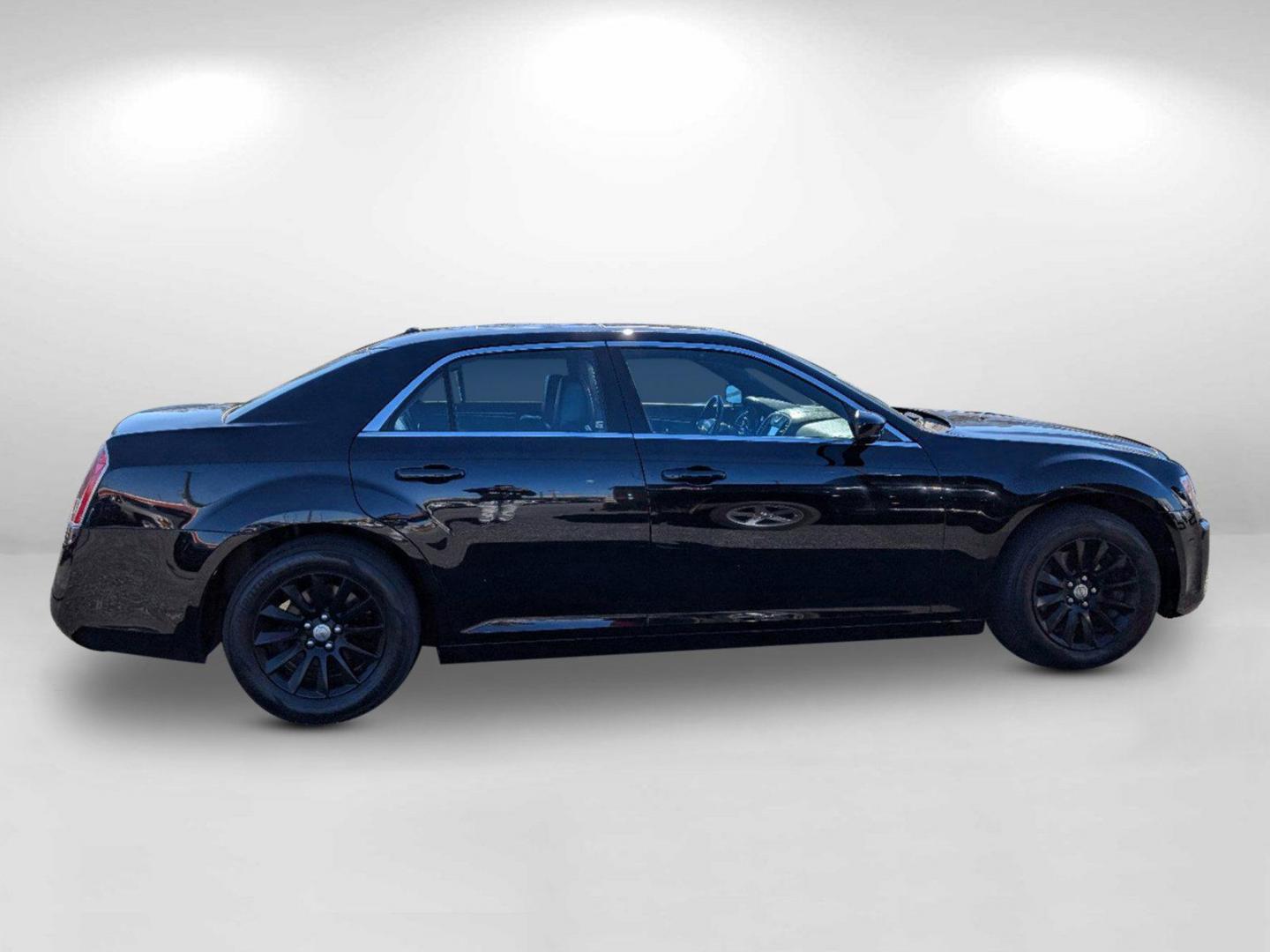 2013 /Black Chrysler 300 (2C3CCAAG8DH) with an Gas/Ethanol V6 3.6L/220 engine, 8-Speed Automatic transmission, located at 3959 U.S. 80 W, Phenix City, AL, 36870, (334) 297-4885, 32.469296, -85.135185 - 2013 Chrysler 300 - Photo#7