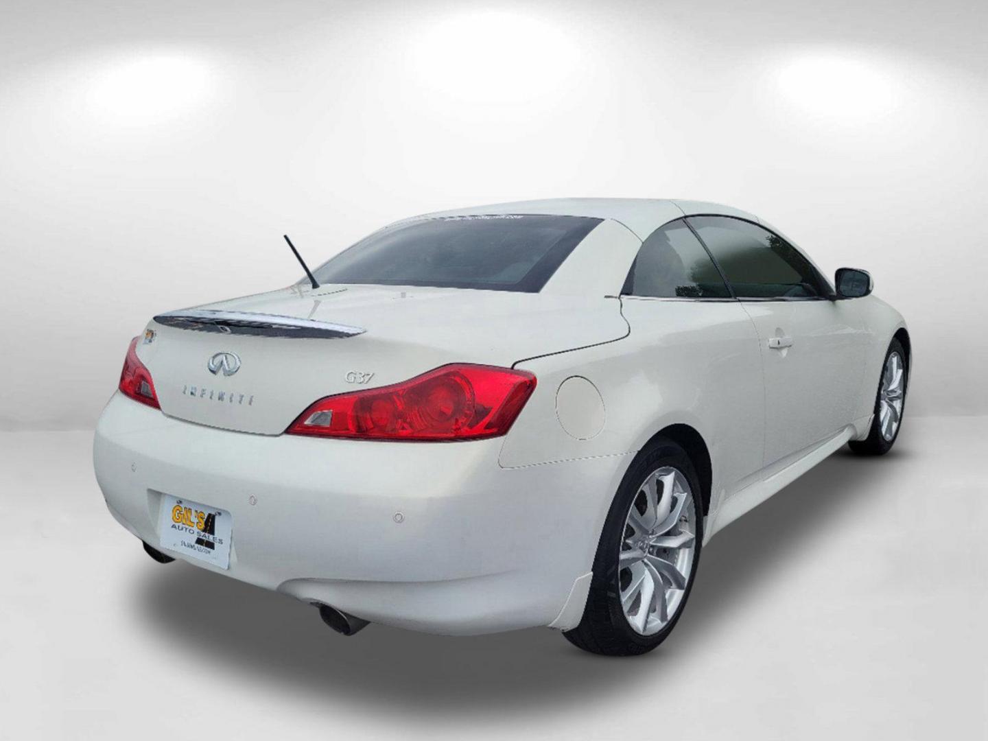 2013 Moonlight White /Wheat INFINITI G37 Convertible Base (JN1CV6FE7DM) with an Gas V6 3.7L/226 engine, 7-Speed Automatic w/OD transmission, located at 1430 Gateway Drive, Opelika, AL, 36801, (334) 239-0944, 32.637871, -85.409790 - 2013 INFINITI G37 Convertible Base - Photo#4