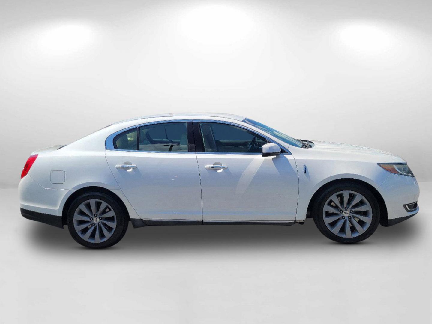 2013 White Lincoln MKS (1LNHL9DKXDG) with an Gas V6 3.7L/ engine, 6-Speed Automatic transmission, located at 7000 Northlake Connector, Columbus, GA, 31904, (706) 987-8085, 32.524975, -84.978134 - 2013 Lincoln MKS - Photo#3