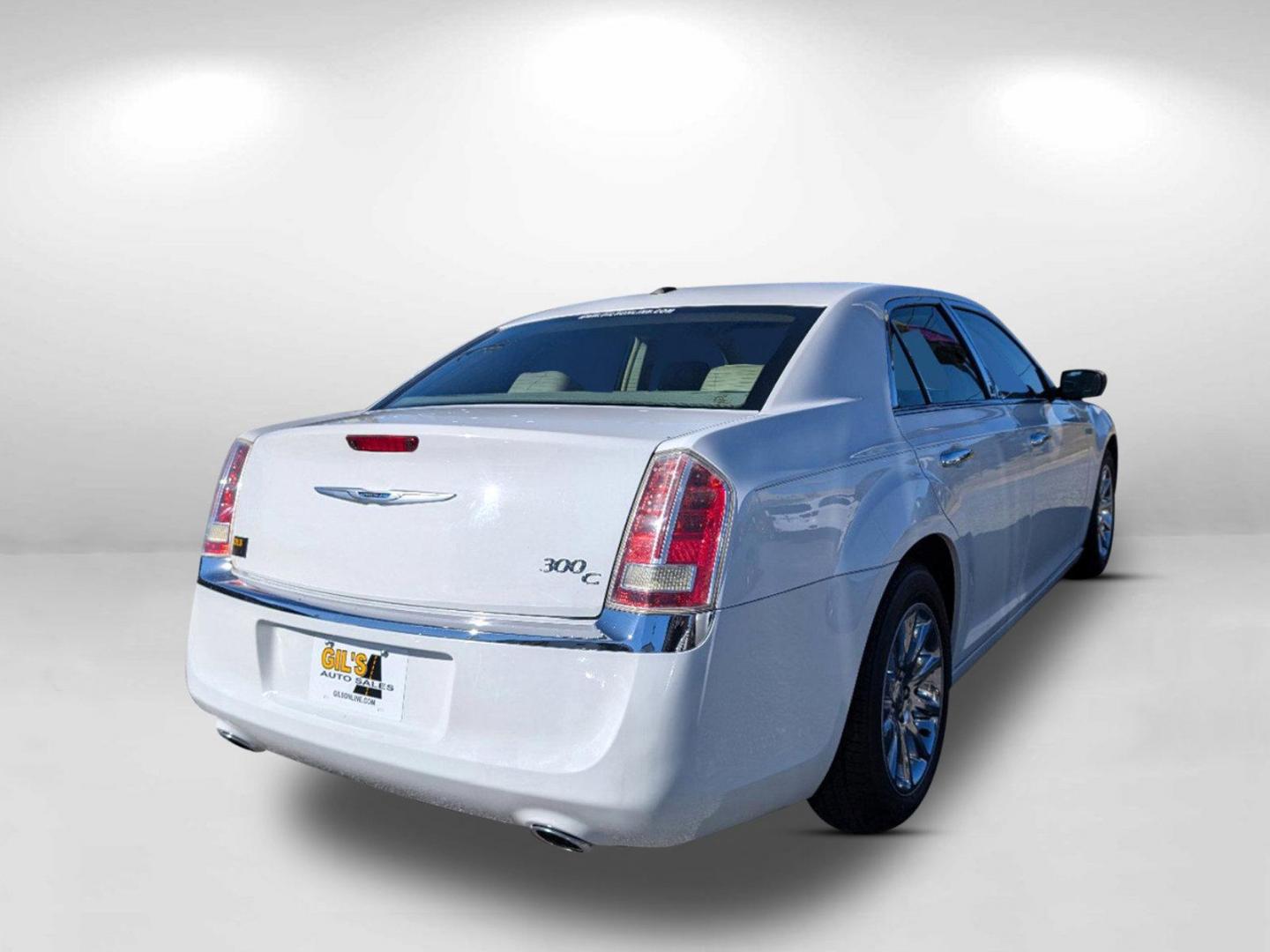 2014 /Lt Frost/Dk Frost Beige Chrysler 300 300C (2C3CCAEG5EH) with an Regular Unleaded V-6 3.6 L/220 engine, 8-Speed Automatic w/OD transmission, located at 3959 U.S. 80 W, Phenix City, AL, 36870, (334) 297-4885, 32.469296, -85.135185 - 2014 Chrysler 300 300C - Photo#4