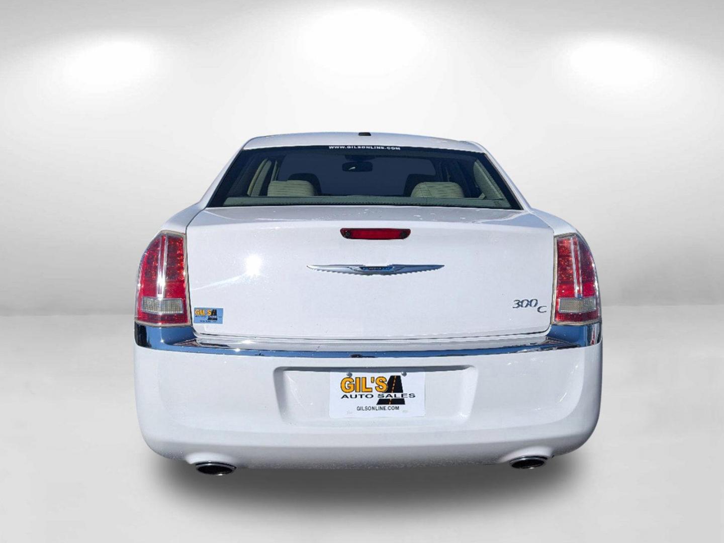 2014 /Lt Frost/Dk Frost Beige Chrysler 300 300C (2C3CCAEG5EH) with an Regular Unleaded V-6 3.6 L/220 engine, 8-Speed Automatic w/OD transmission, located at 3959 U.S. 80 W, Phenix City, AL, 36870, (334) 297-4885, 32.469296, -85.135185 - 2014 Chrysler 300 300C - Photo#5