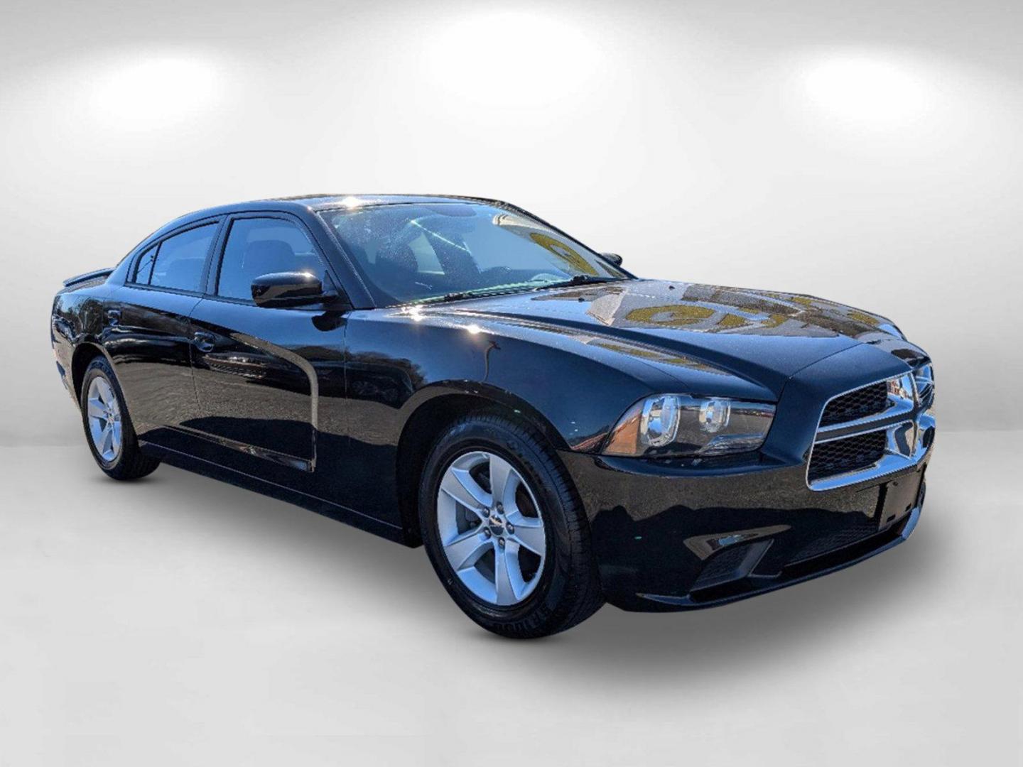 2014 /Black Dodge Charger SE (2C3CDXBG1EH) with an Regular Unleaded V-6 3.6 L/220 engine, 5-Speed Automatic w/OD transmission, located at 3959 U.S. 80 W, Phenix City, AL, 36870, (334) 297-4885, 32.469296, -85.135185 - 2014 Dodge Charger SE - Photo#4