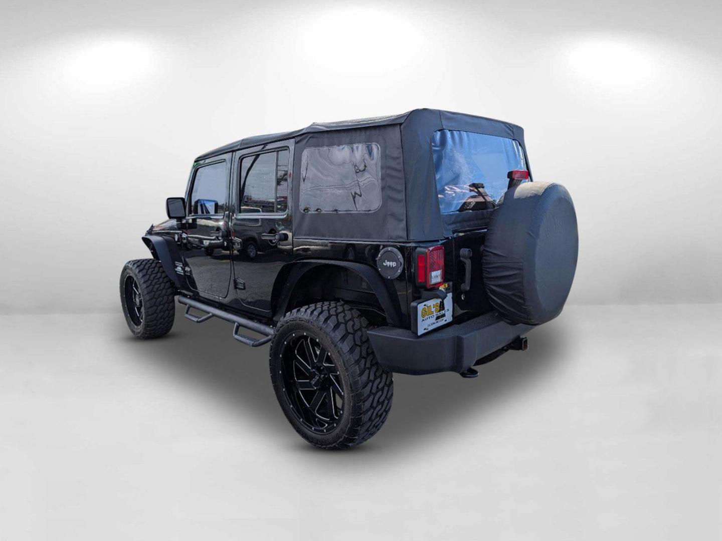 2014 /Black Jeep Wrangler Unlimited Sport (1C4BJWDG7EL) with an Regular Unleaded V-6 3.6 L/220 engine, 5-Speed Automatic w/OD transmission, located at 521 Old Farm Lane Rd, Prattville, AL, 36066, (334) 325-1505, 32.482460, -86.416367 - 2014 Jeep Wrangler Unlimited Sport - Photo#6