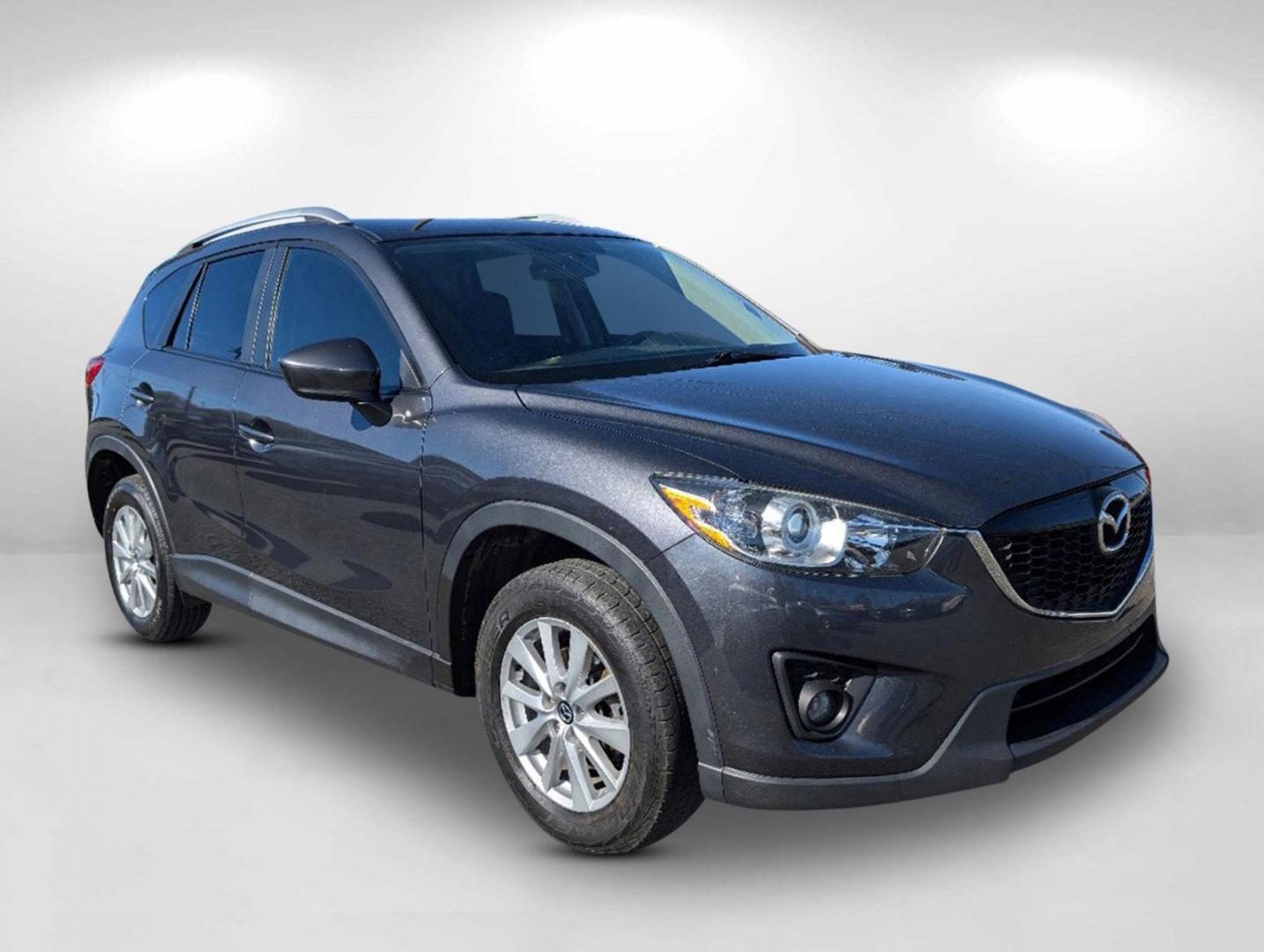 2014 /Black Mazda CX-5 Touring (JM3KE2CY1E0) with an Regular Unleaded I-4 2.5 L/152 engine, 6-Speed Automatic w/OD transmission, located at 3959 U.S. 80 W, Phenix City, AL, 36870, (334) 297-4885, 32.469296, -85.135185 - 2014 Mazda CX-5 Touring - Photo#5