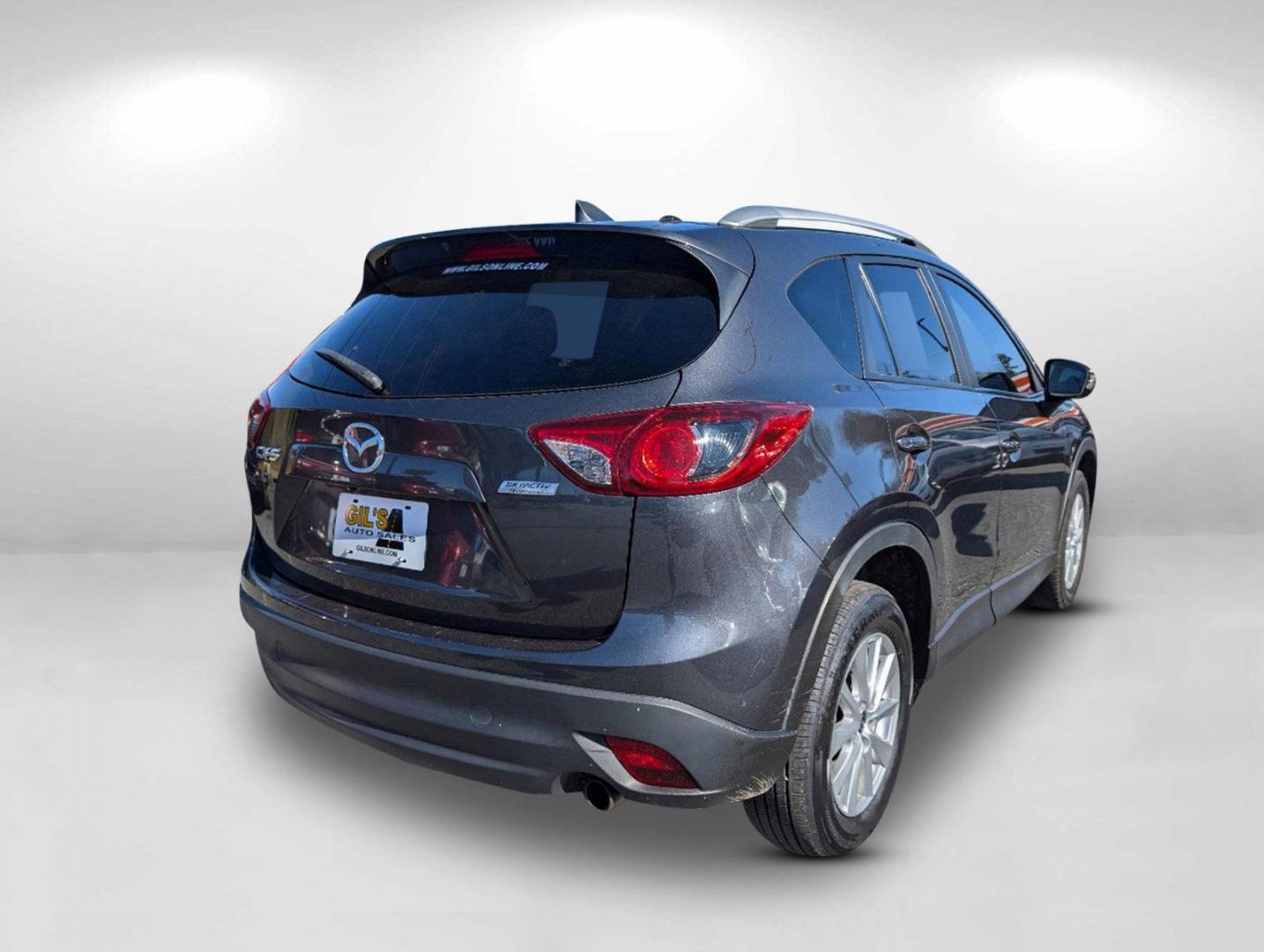 2014 /Black Mazda CX-5 Touring (JM3KE2CY1E0) with an Regular Unleaded I-4 2.5 L/152 engine, 6-Speed Automatic w/OD transmission, located at 3959 U.S. 80 W, Phenix City, AL, 36870, (334) 297-4885, 32.469296, -85.135185 - 2014 Mazda CX-5 Touring - Photo#7