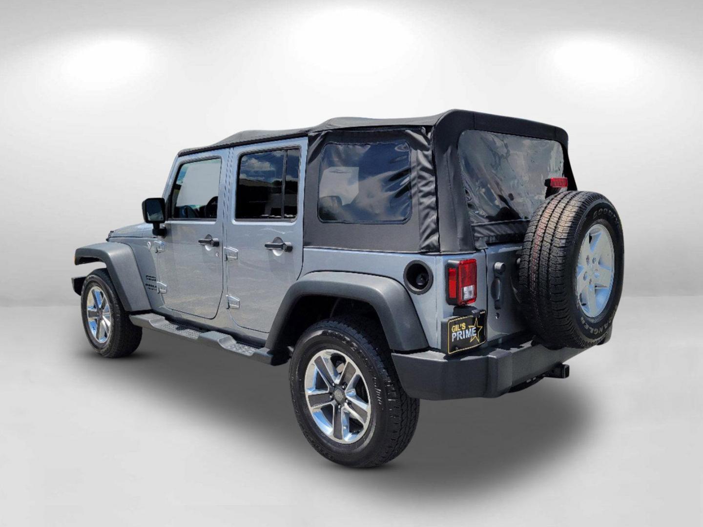 2015 Billet Silver Metallic Clearcoat /Black Jeep Wrangler Unlimited Sport (1C4HJWDG2FL) with an Regular Unleaded V-6 3.6 L/220 engine, 5-Speed Automatic w/OD transmission, located at 7000 Northlake Connector, Columbus, GA, 31904, (706) 987-8085, 32.524975, -84.978134 - 2015 Jeep Wrangler Unlimited Sport - Photo#6