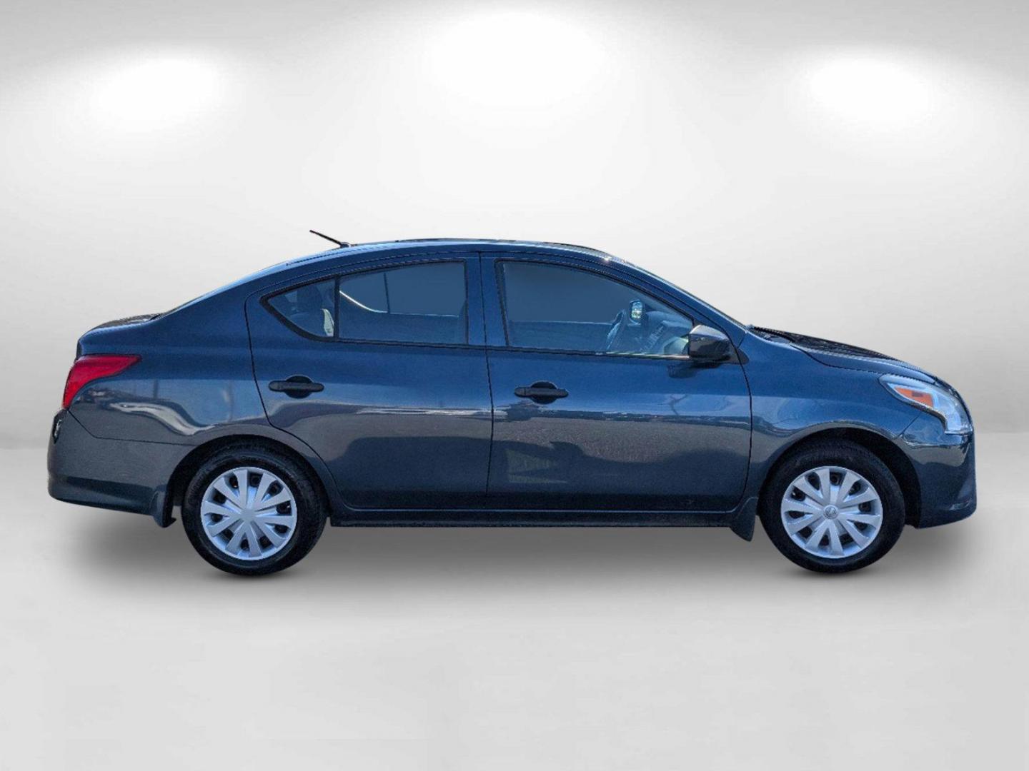 2016 /Charcoal Nissan Versa S (3N1CN7AP7GL) with an Regular Unleaded I-4 1.6 L/98 engine, 5-Speed Manual w/OD transmission, located at 1430 Gateway Drive, Opelika, AL, 36801, (334) 239-0944, 32.637871, -85.409790 - 2016 Nissan Versa S - Photo#5