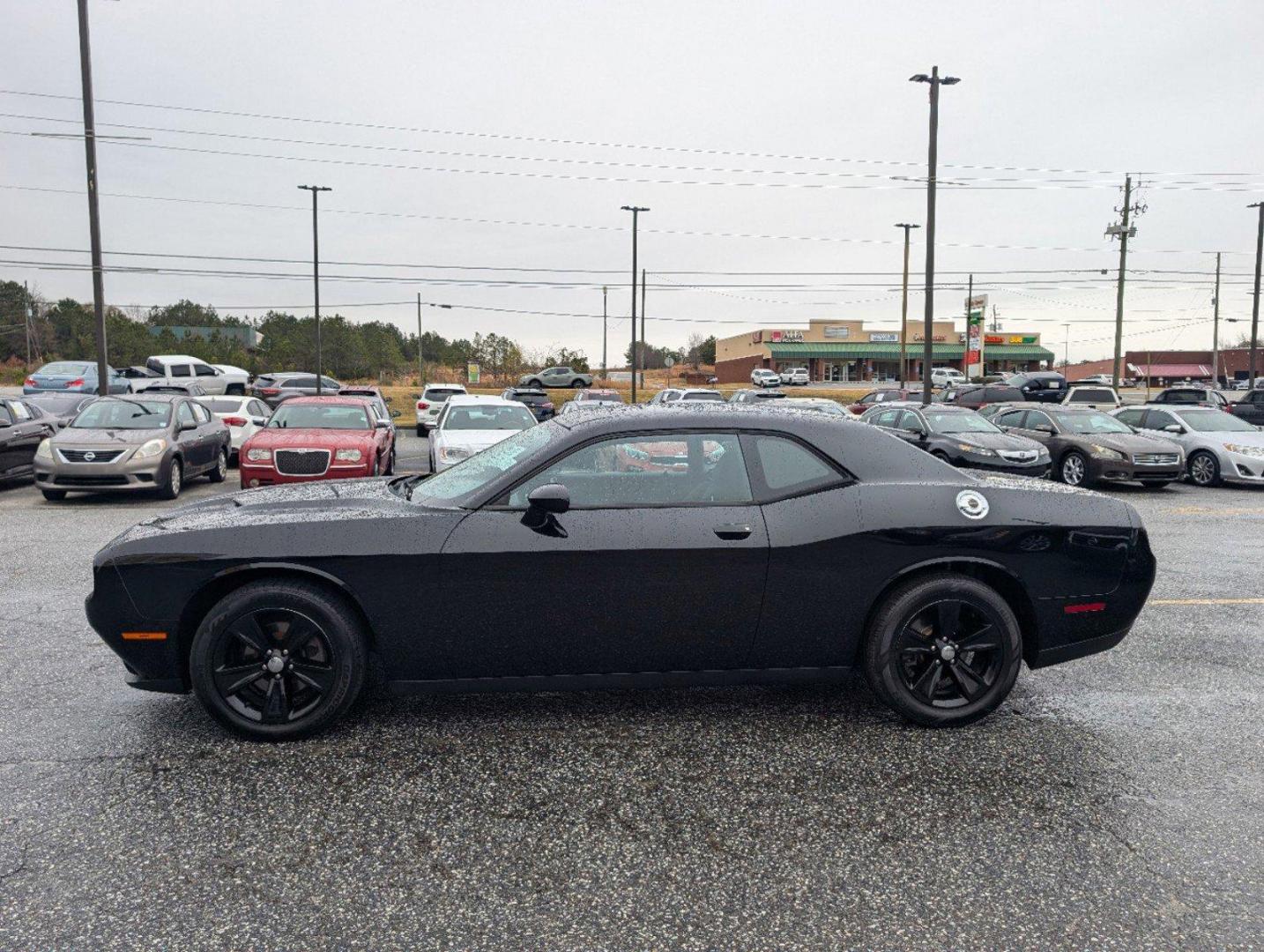 2017 /Black Dodge Challenger SXT (2C3CDZAG5HH) with an Regular Unleaded V-6 3.6 L/220 engine, 8-Speed Automatic w/OD transmission, located at 3959 U.S. 80 W, Phenix City, AL, 36870, (334) 297-4885, 32.469296, -85.135185 - 2017 Dodge Challenger SXT - Photo#7