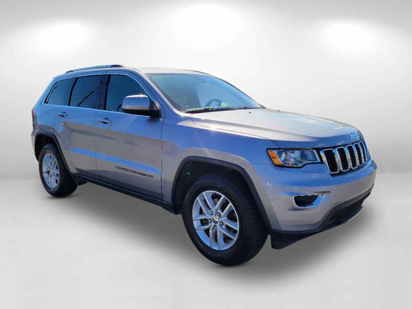 2017 Billet Silver Metallic Clearcoat /Black Jeep Grand Cherokee Laredo (1C4RJEAG7HC) with an Regular Unleaded V-6 3.6 L/220 engine, 8-Speed Automatic w/OD transmission, located at 7000 Northlake Connector, Columbus, GA, 31904, (706) 987-8085, 32.524975, -84.978134 - 2017 Jeep Grand Cherokee Laredo - Photo#2