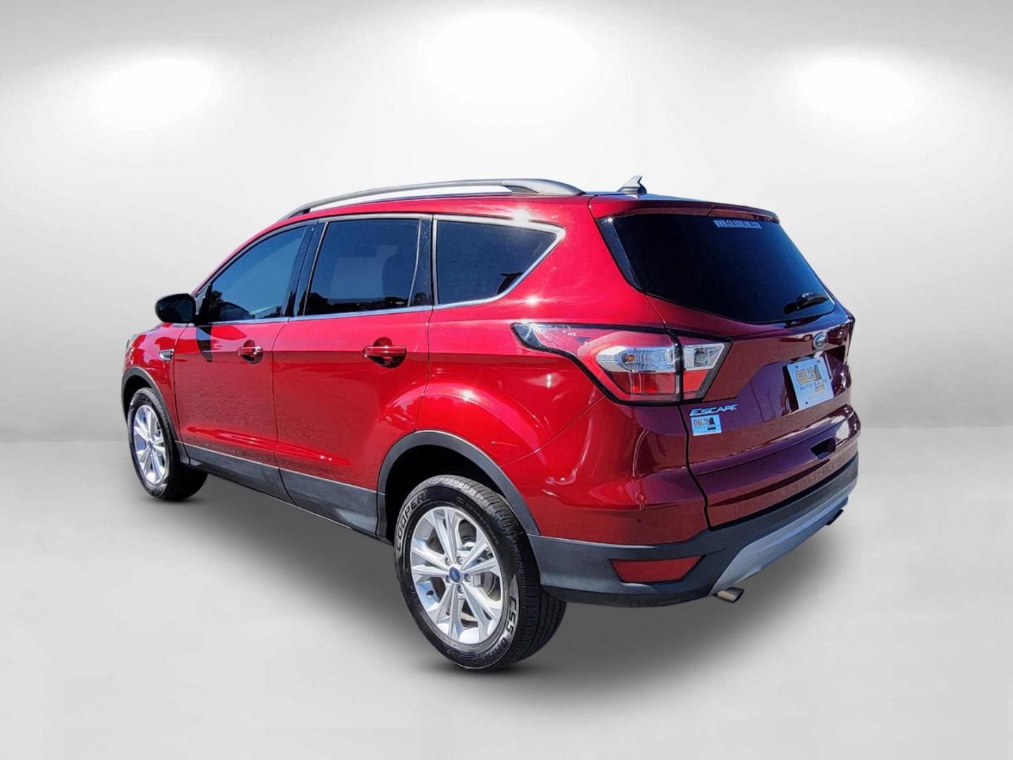 2018 Red Ford Escape SE (1FMCU9GD1JU) with an Intercooled Turbo Regular Unleaded I-4 1.5 L/91 engine, 6-Speed Automatic w/OD transmission, located at 7000 Northlake Connector, Columbus, GA, 31904, (706) 987-8085, 32.524975, -84.978134 - 2018 Ford Escape SE - Photo#6