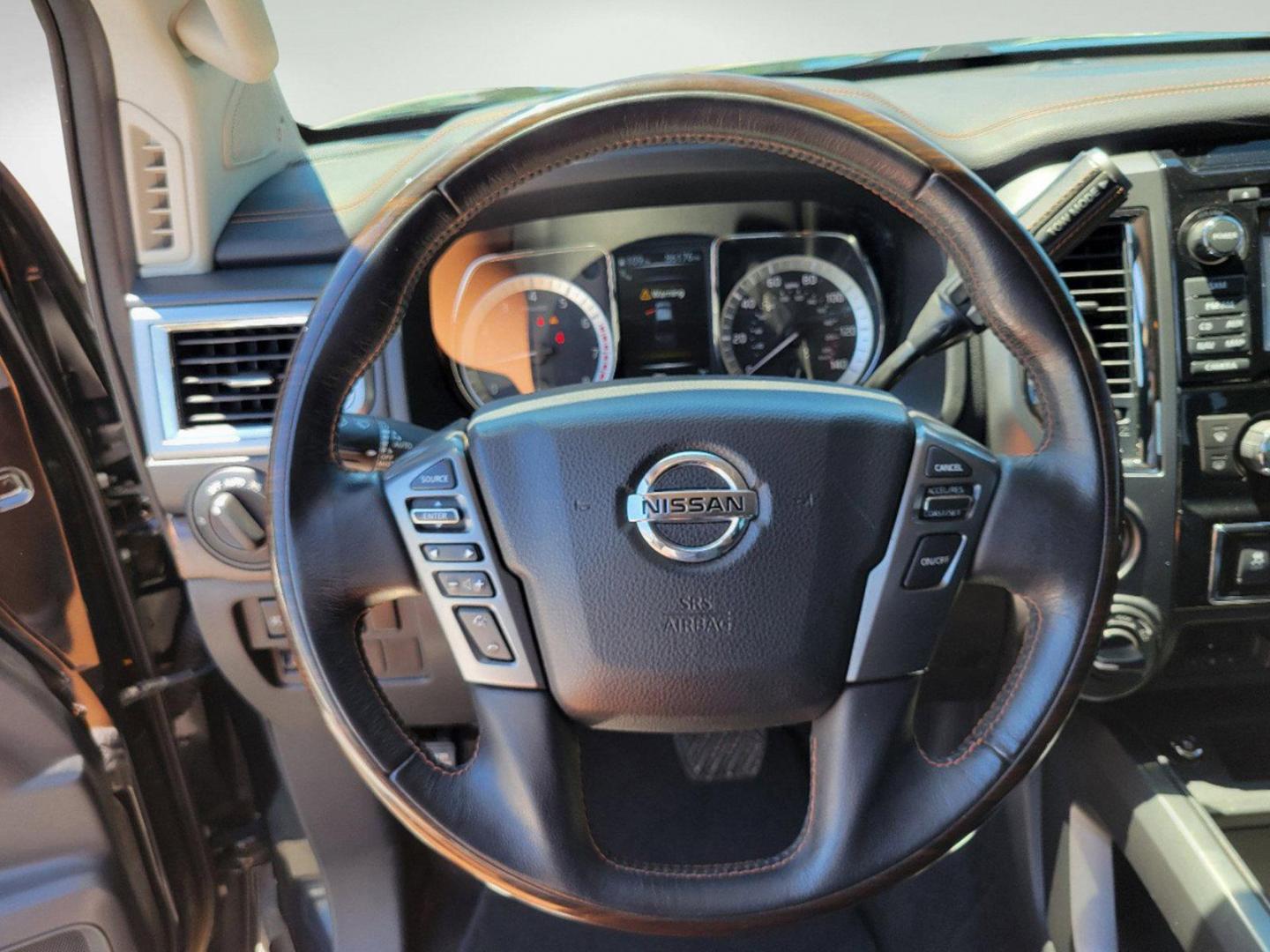 2018 Magnetic Black /Black/Brown Nissan Titan Platinum Reserve (1N6AA1E58JN) with an Regular Unleaded V-8 5.6 L/339 engine, 7-Speed Automatic w/OD transmission, located at 1430 Gateway Drive, Opelika, AL, 36801, (334) 239-0944, 32.637871, -85.409790 - 2018 Nissan Titan Platinum Reserve - Photo#12