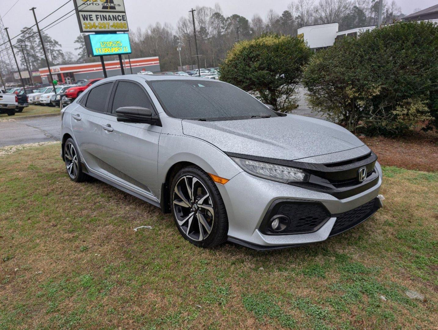 2019 Honda Civic Hatchback Sport Touring (SHHFK7H94KU) with an Intercooled Turbo Premium Unleaded I-4 1.5 L/91 engine, 1-Speed CVT w/OD transmission, located at 7000 Northlake Connector, Columbus, GA, 31904, (706) 987-8085, 32.524975, -84.978134 - 2019 Honda Civic Hatchback Sport Touring - Photo#2