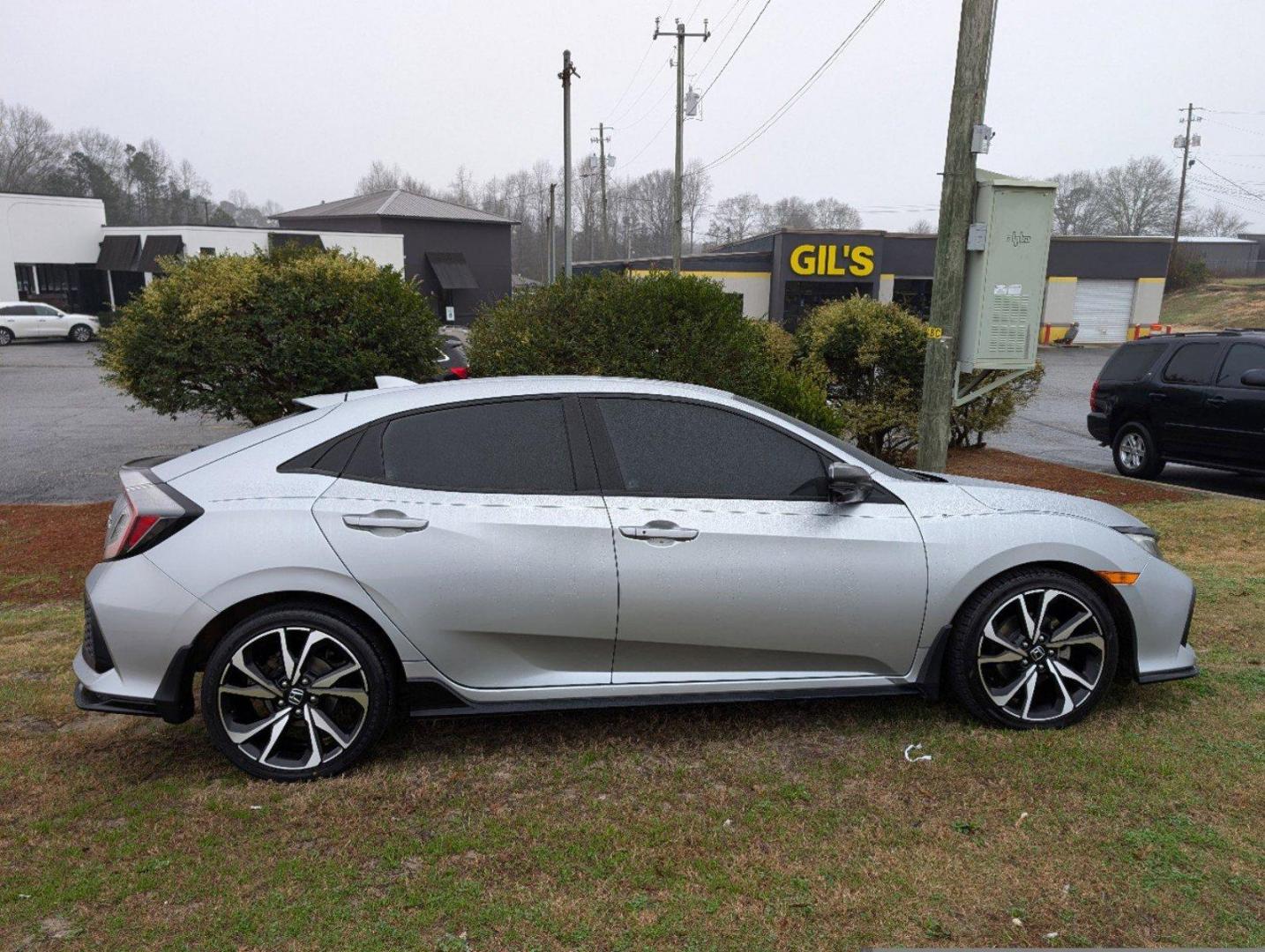 2019 Honda Civic Hatchback Sport Touring (SHHFK7H94KU) with an Intercooled Turbo Premium Unleaded I-4 1.5 L/91 engine, 1-Speed CVT w/OD transmission, located at 7000 Northlake Connector, Columbus, GA, 31904, (706) 987-8085, 32.524975, -84.978134 - 2019 Honda Civic Hatchback Sport Touring - Photo#3