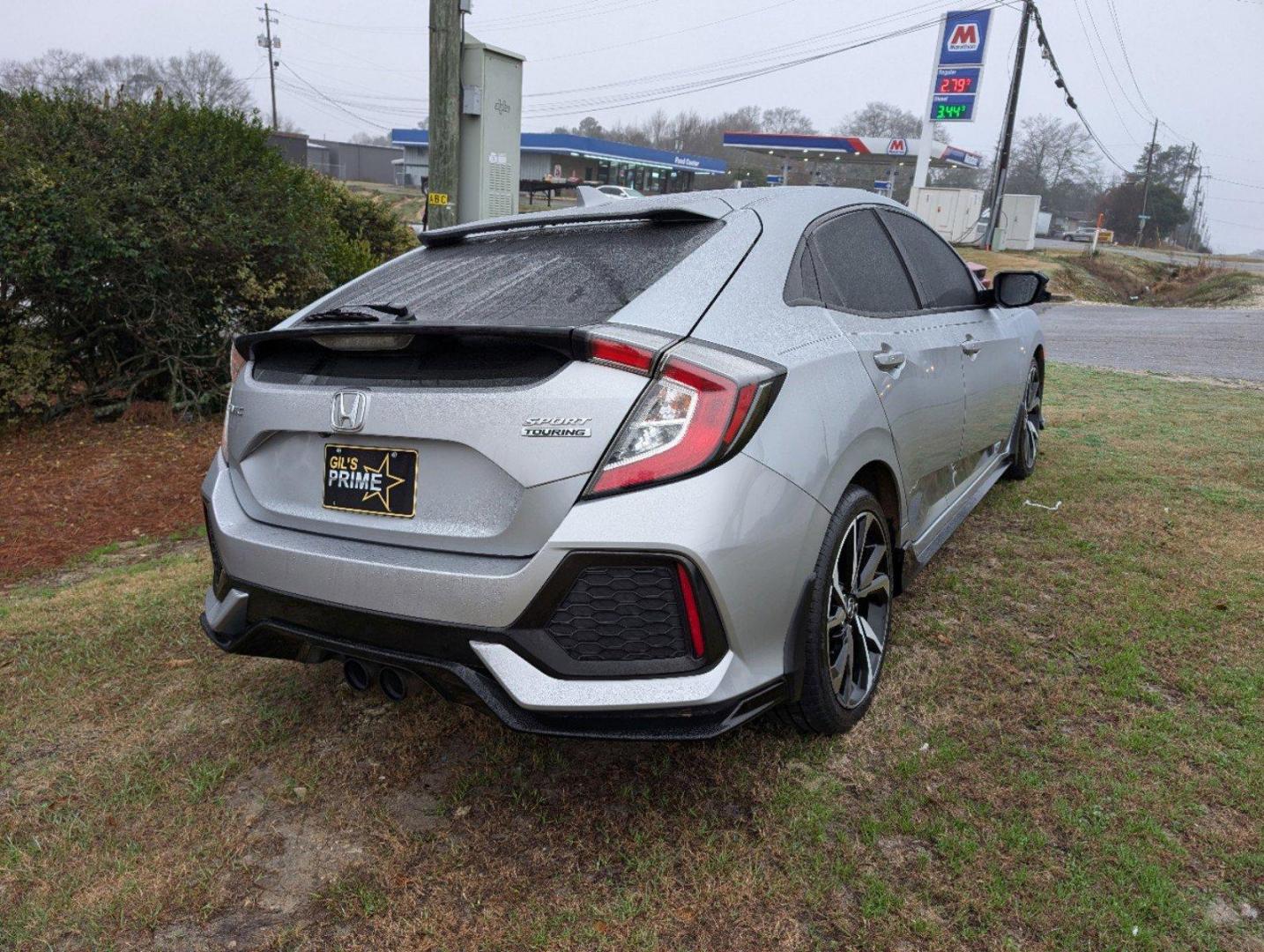 2019 Honda Civic Hatchback Sport Touring (SHHFK7H94KU) with an Intercooled Turbo Premium Unleaded I-4 1.5 L/91 engine, 1-Speed CVT w/OD transmission, located at 7000 Northlake Connector, Columbus, GA, 31904, (706) 987-8085, 32.524975, -84.978134 - 2019 Honda Civic Hatchback Sport Touring - Photo#4