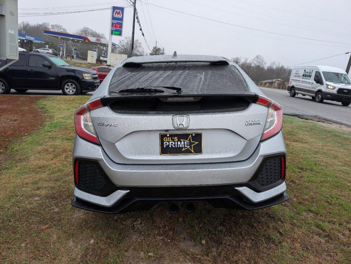 2019 Honda Civic Hatchback Sport Touring (SHHFK7H94KU) with an Intercooled Turbo Premium Unleaded I-4 1.5 L/91 engine, 1-Speed CVT w/OD transmission, located at 7000 Northlake Connector, Columbus, GA, 31904, (706) 987-8085, 32.524975, -84.978134 - 2019 Honda Civic Hatchback Sport Touring - Photo#5