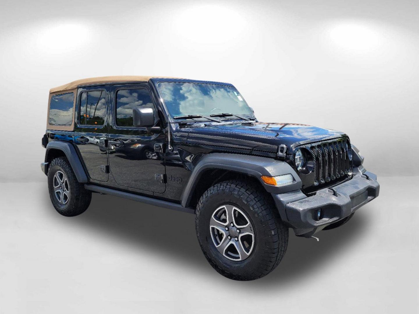 2020 Black Clearcoat /Heritage Tan/Black Jeep Wrangler Unlimited Black and Tan (1C4HJXDG9LW) with an Regular Unleaded V-6 3.6 L/220 engine, 8-Speed Automatic w/OD transmission, located at 3959 U.S. 80 W, Phenix City, AL, 36870, (334) 297-4885, 32.469296, -85.135185 - 2020 Jeep Wrangler Unlimited Black and Tan - Photo#2