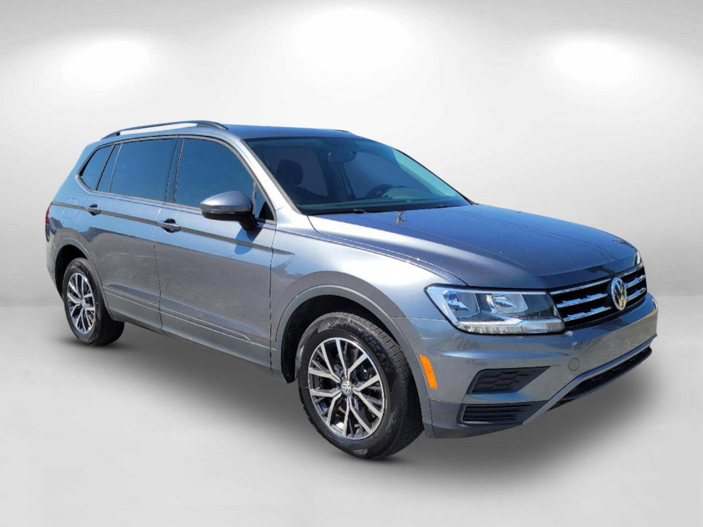 2021 Gray Volkswagen Tiguan S (3VV1B7AX7MM) with an Intercooled Turbo Regular Unleaded I-4 2.0 L/121 engine, 8-Speed Automatic w/OD transmission, located at 1430 Gateway Drive, Opelika, AL, 36801, (334) 239-0944, 32.637871, -85.409790 - 2021 Volkswagen Tiguan S - Photo#2