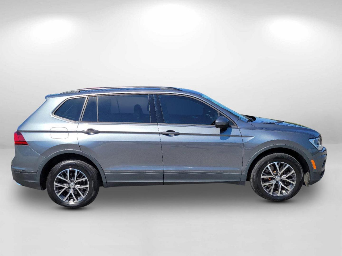 2021 Gray Volkswagen Tiguan S (3VV1B7AX7MM) with an Intercooled Turbo Regular Unleaded I-4 2.0 L/121 engine, 8-Speed Automatic w/OD transmission, located at 1430 Gateway Drive, Opelika, AL, 36801, (334) 239-0944, 32.637871, -85.409790 - 2021 Volkswagen Tiguan S - Photo#3